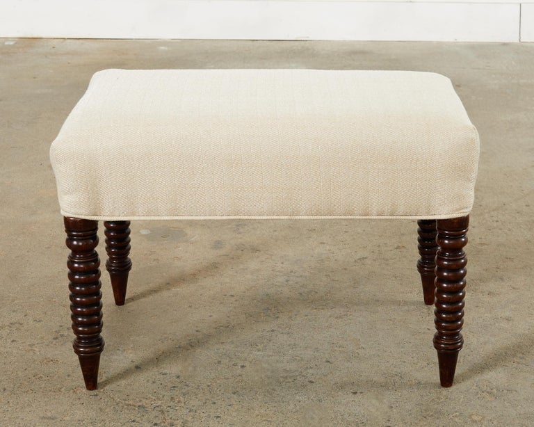 https://a.1stdibscdn.com/walnut-footstool-or-ottoman-with-bobbin-turned-spool-legs-for-sale-picture-3/f_15552/f_364786521696559549359/Cream_Footstool_1_master.jpg?width=768
