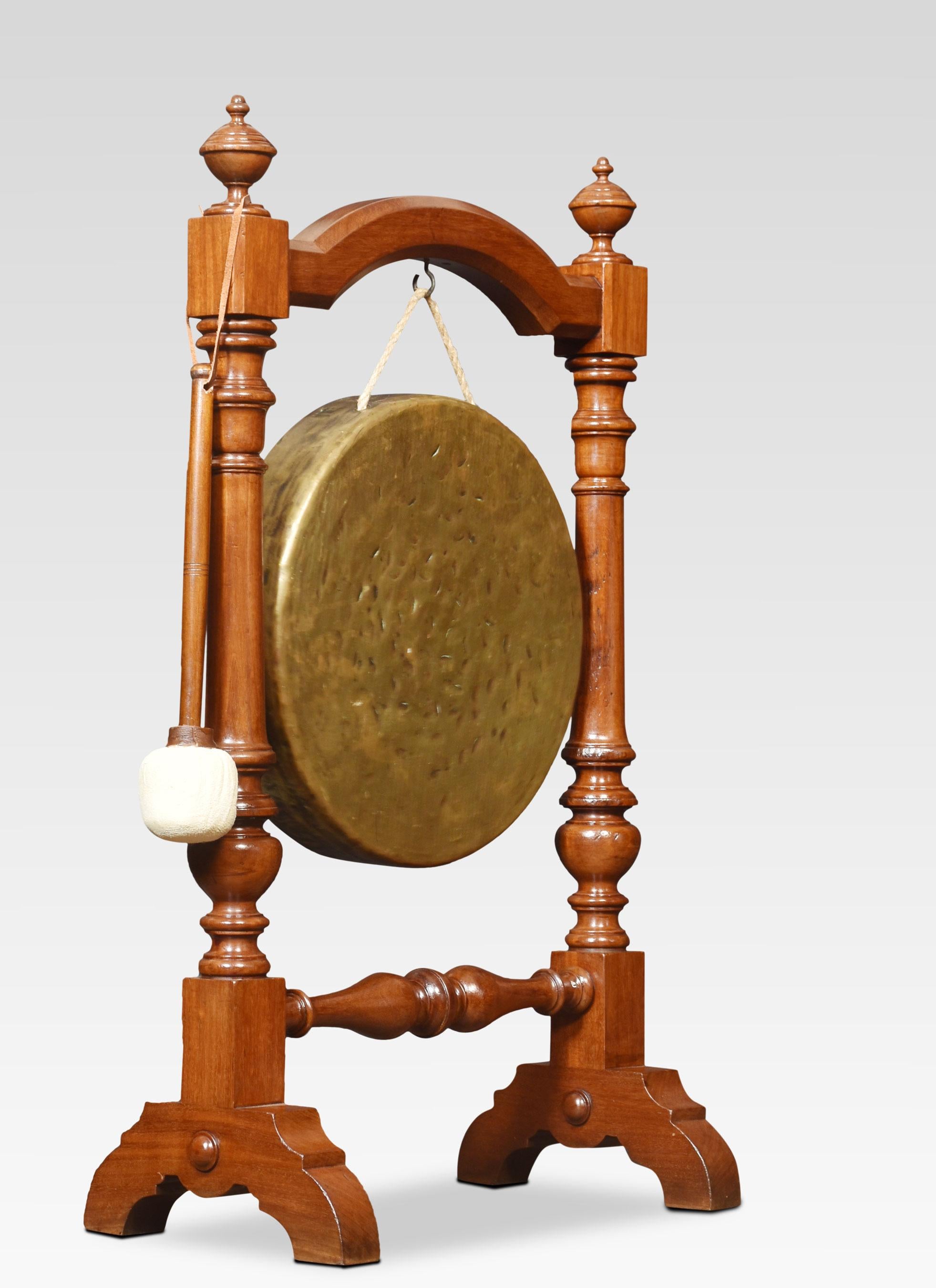 Walnut diner gong having turned finials above the arched frame and turned uprights supporting the original brass gong. All raised up on splayed supports.
Dimensions
Height 32 Inches
Width 19 Inches
Depth 10 Inches