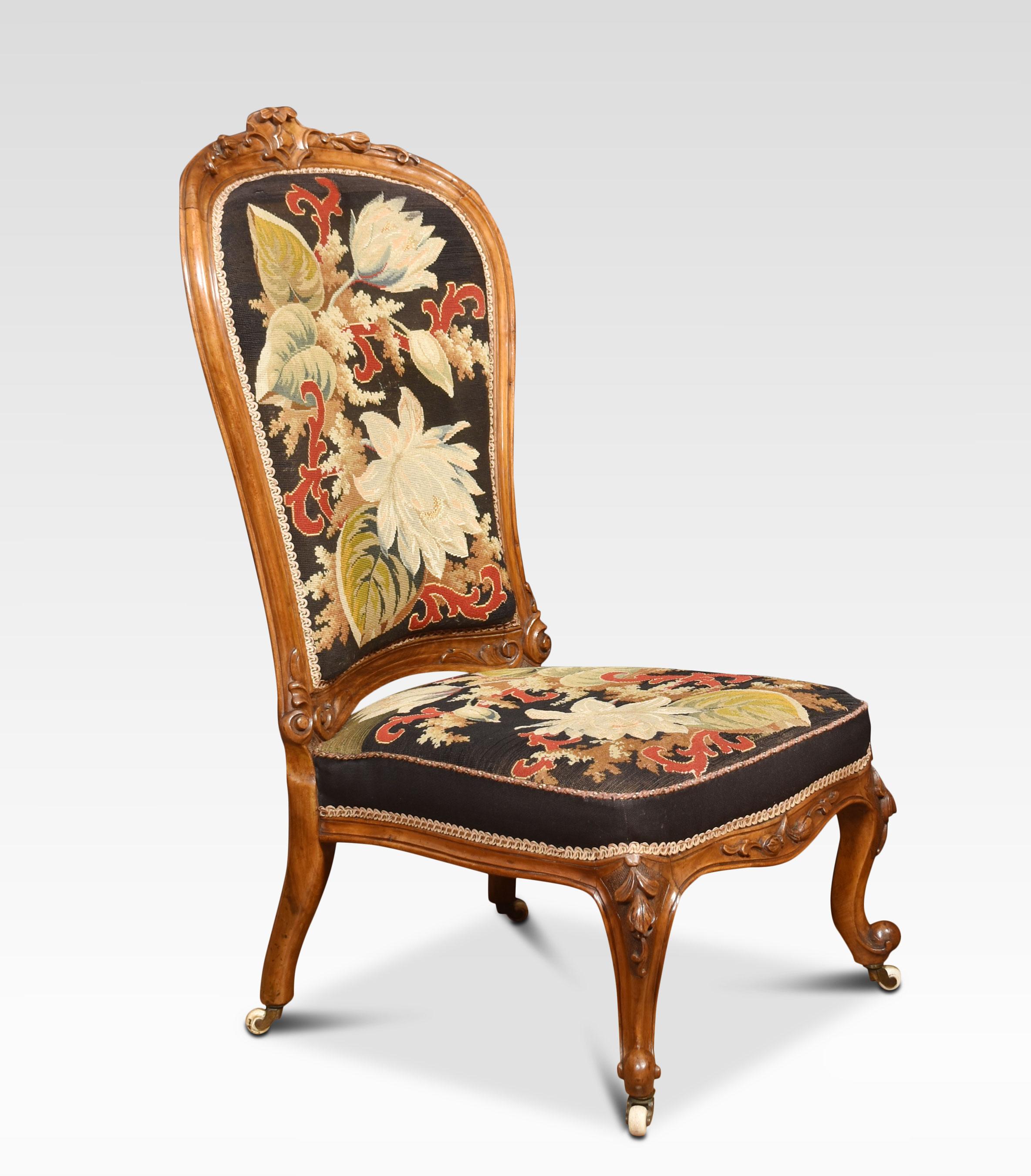 Walnut nursing chair the foliate carved frame with needlepoint upholstered back and seat. All raised up on foliate carved squat cabriole legs and ceramic castors.
Dimensions
Height 41.5 inches height to seat 14 Inches
Width 21.5 inches
Depth 27