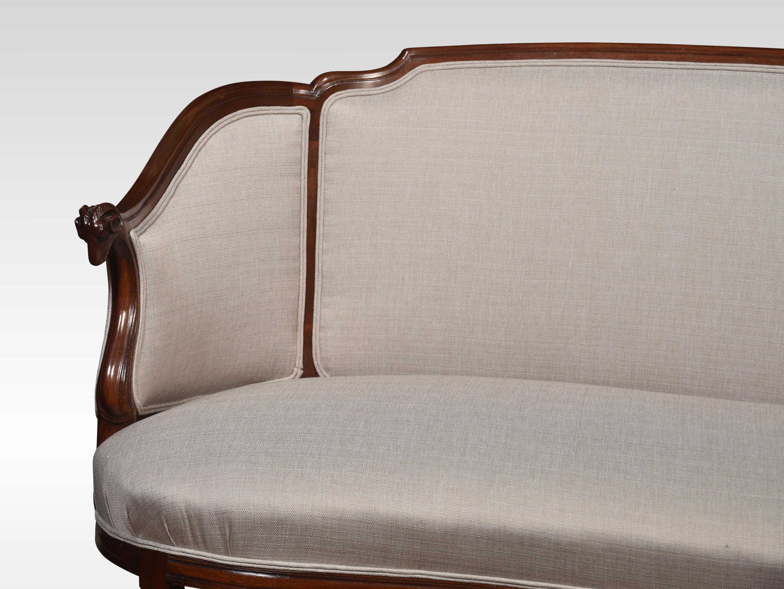 Walnut framed two-seater settee the shaped top rail above upholstered back and seat enclosed by outswept rams headed arms. All raised up on tapering legs.
Dimensions
Height 37 Inches height to seat 18 Inches
Width 56.5 Inches
Depth 28 Inches.