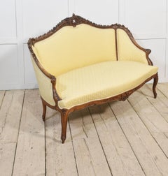 Walnut framed two-seater settee