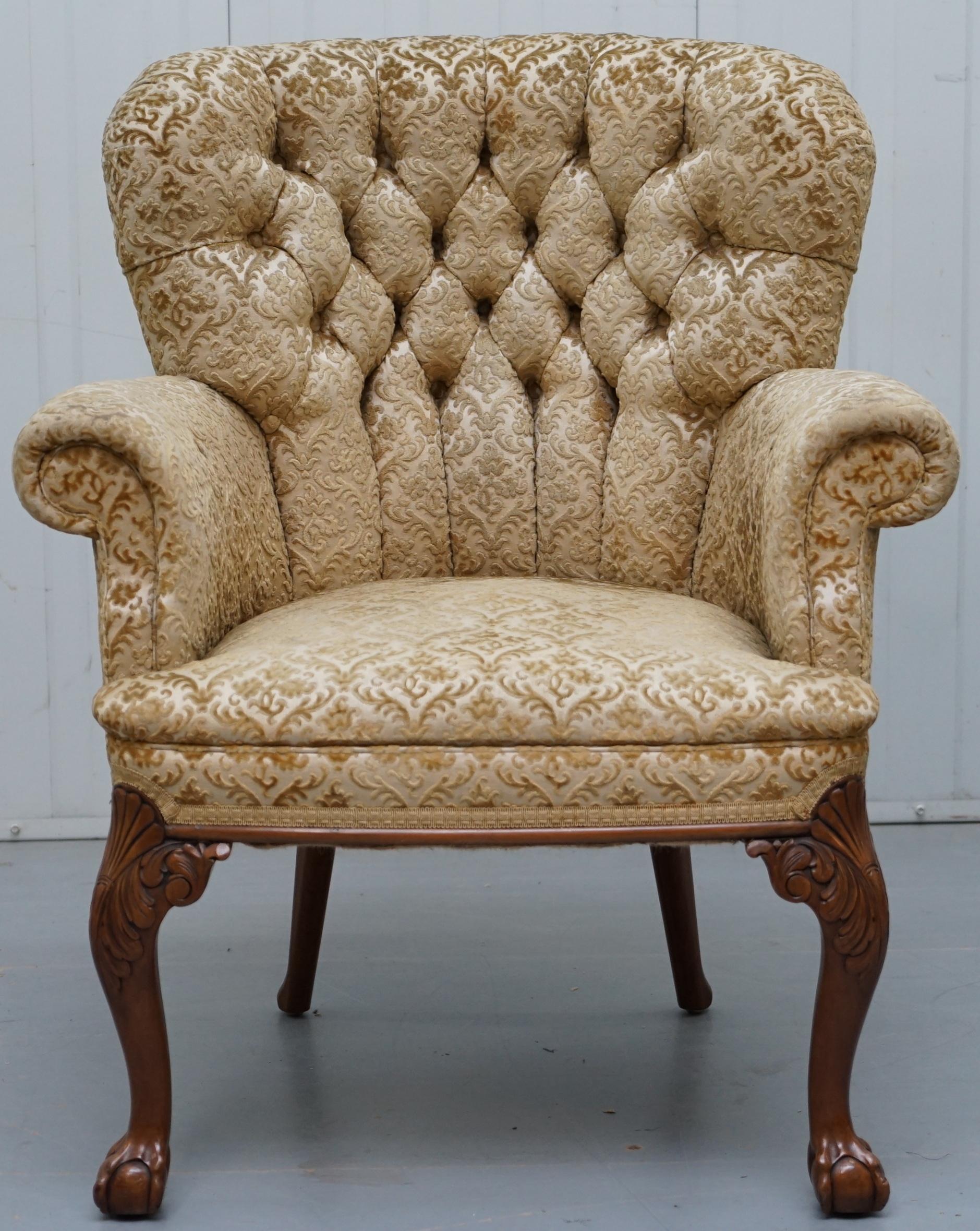 We are delighted to offer this very rare George II style Chesterfield buttoned occasional armchair with ornate hand carved cabriolet legs which start with acanthus leaves and finish with claw and balls.

An exquisite looking and very comfortable
