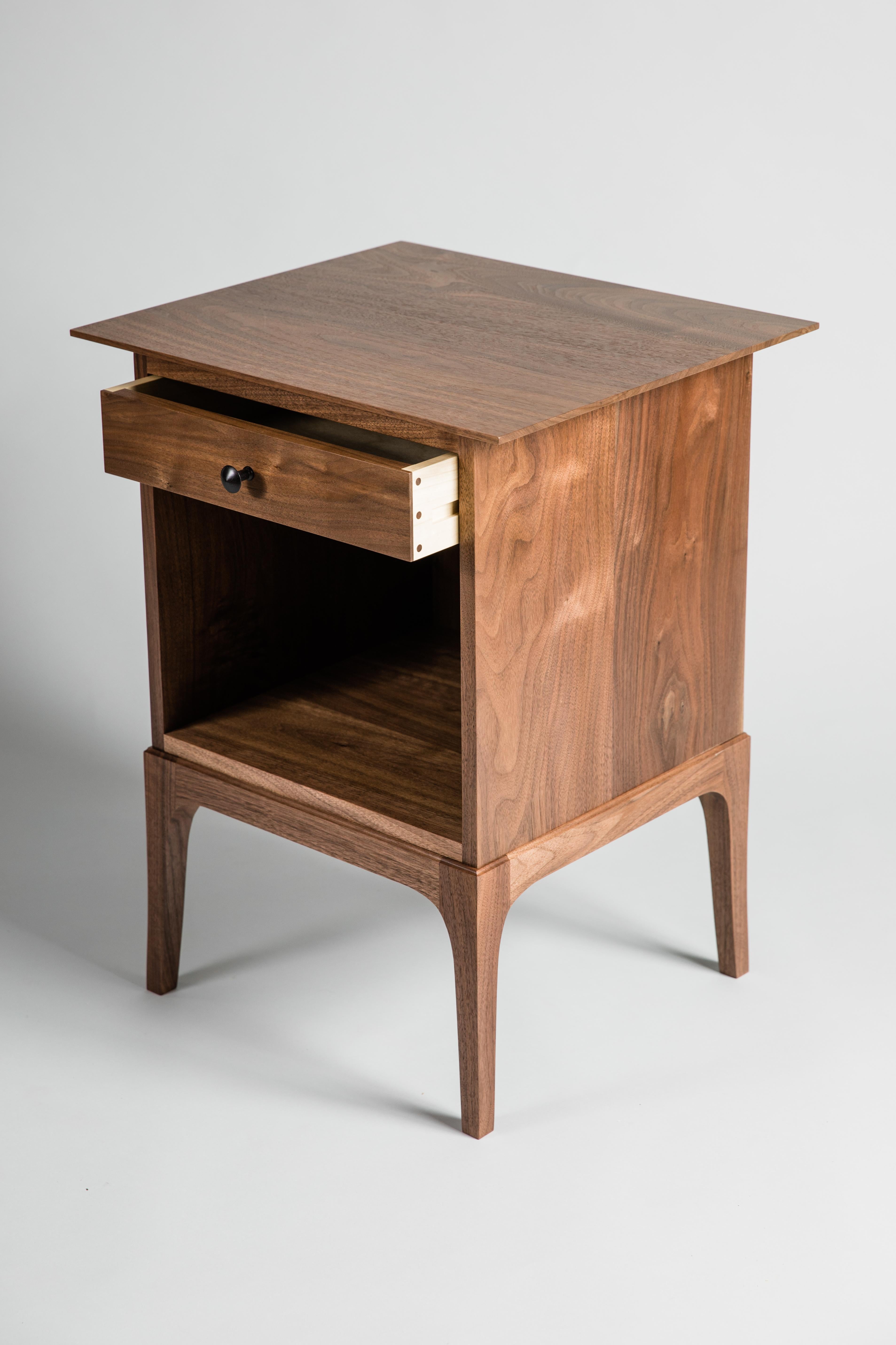 The Glendale nightstand is made of solid walnut with a poplar drawer. The details are carefully designed and executed to work harmoniously with the whole piece. Sleek curves and coves give the piece a sculptural quality, lightening its visual weight