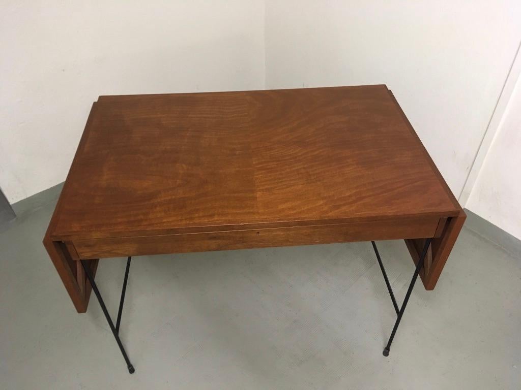 Walnut top and black iron base architecte extendable high desk table circa 1950s
Origin unknown
Big front drawer ( no key ) 2 extensions with elegant system ( pictures )
One rubber glide is missing
Very good condition
Measures: L 115 cm + (2 x