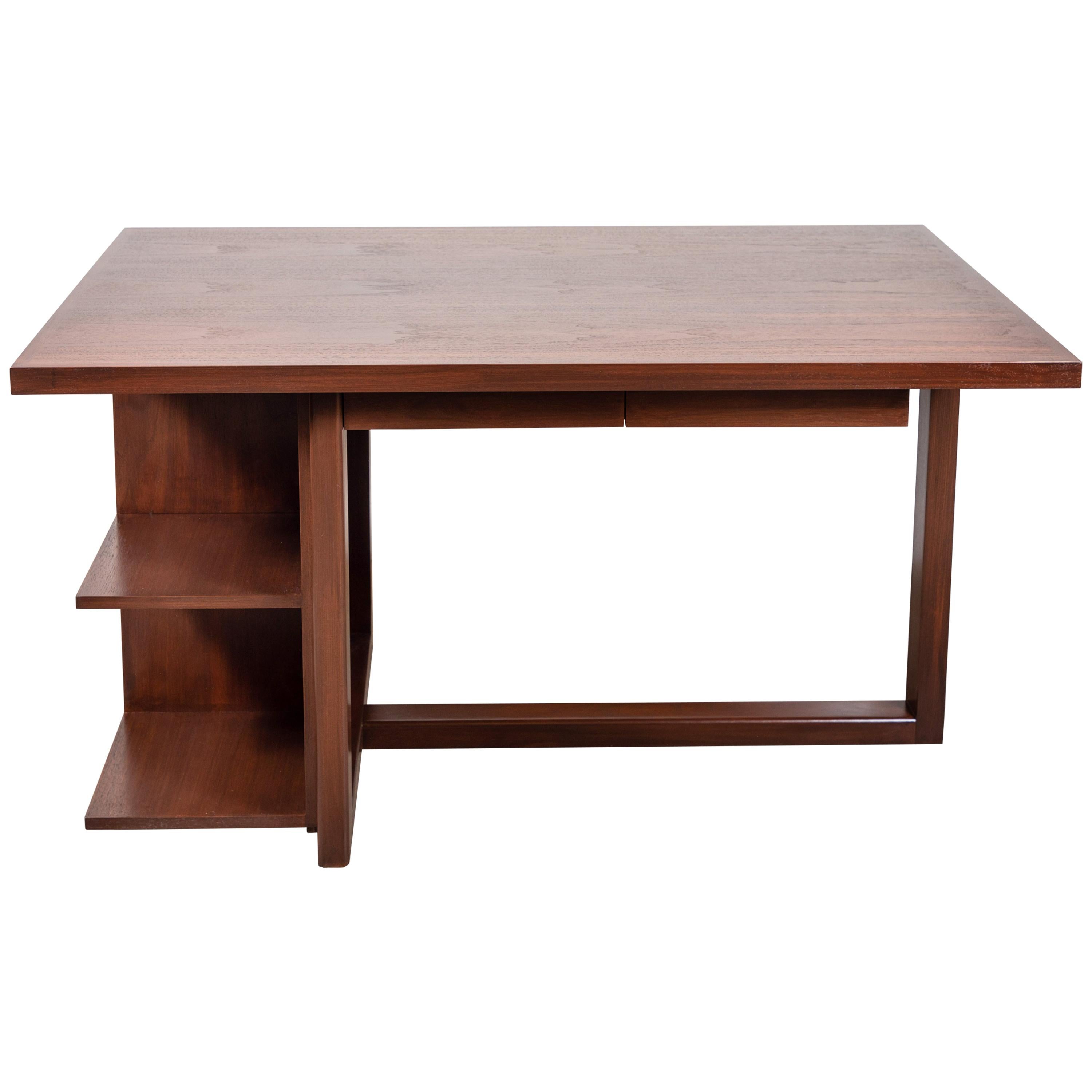 The Ivanhoe Desk features a cantilevered base with open display shelves. Available in American walnut or white oak and drawers are available upon request. Shown here in light walnut. 

The Lawson-Fenning Collection is designed and handmade in Los