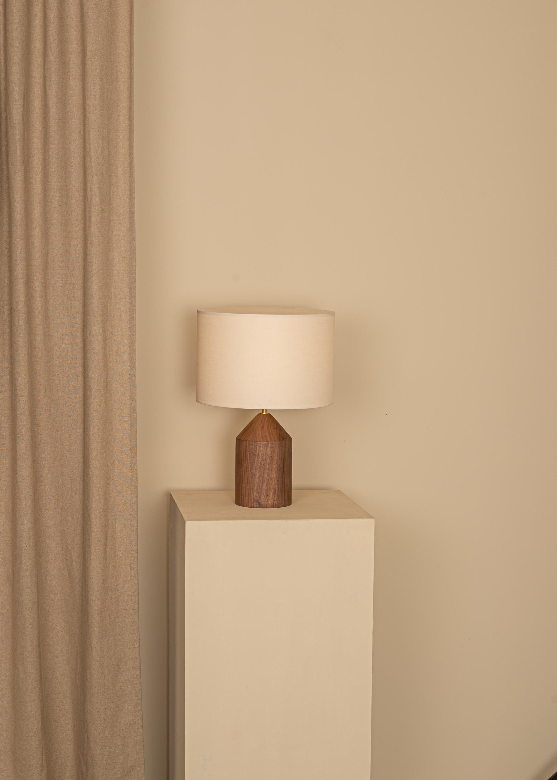 Walnut Josef Table Lamp by Simone & Marcel
Dimensions: Ø 30 x H 41.5 cm.
Materials: Brass, cotton and walnut.

Also available in different marble, wood and alabaster options and finishes. Custom options available on request. Please contact us. 

All