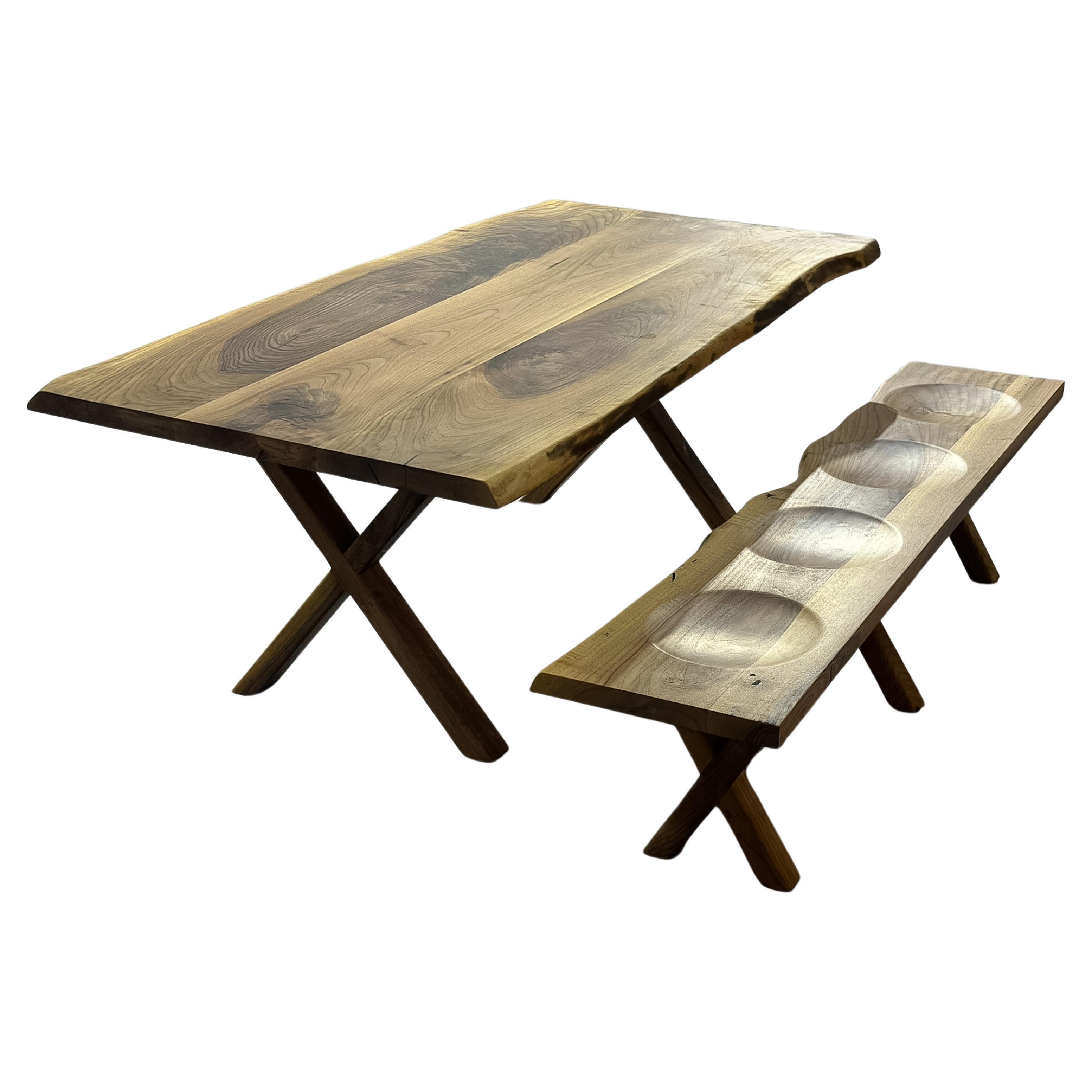 Custom Walnut Live Edge Kitchen Table 

This table is made of Walnut Wood. The grains and texture of the wood describe what a natural walnut woods looks like.
It can be used as a dining table or as a conference table. Suitable for indoor use.

All