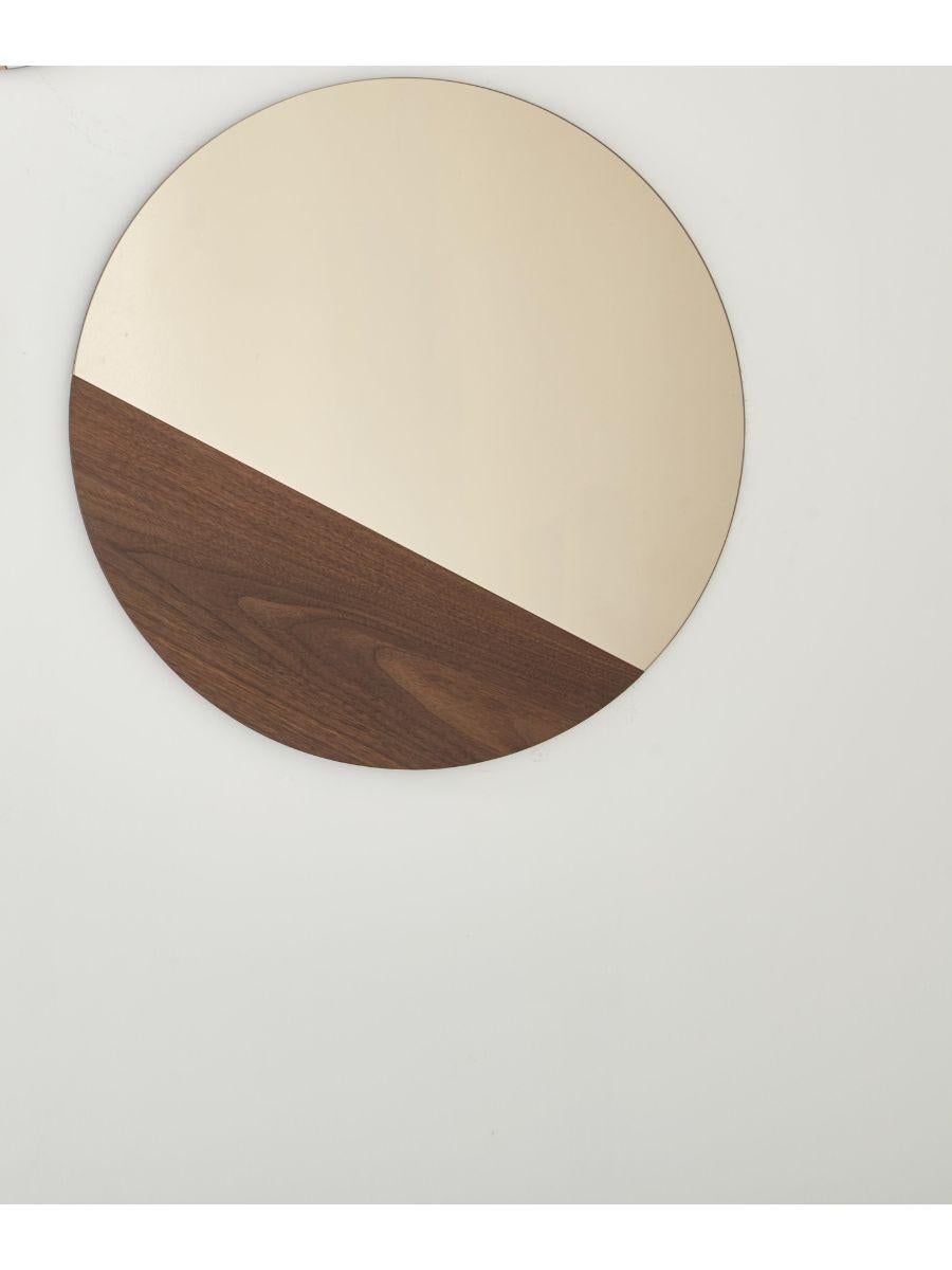 Walnut large horizon mirror by Hollis & Morris
Dimensions: Diameter 25.5