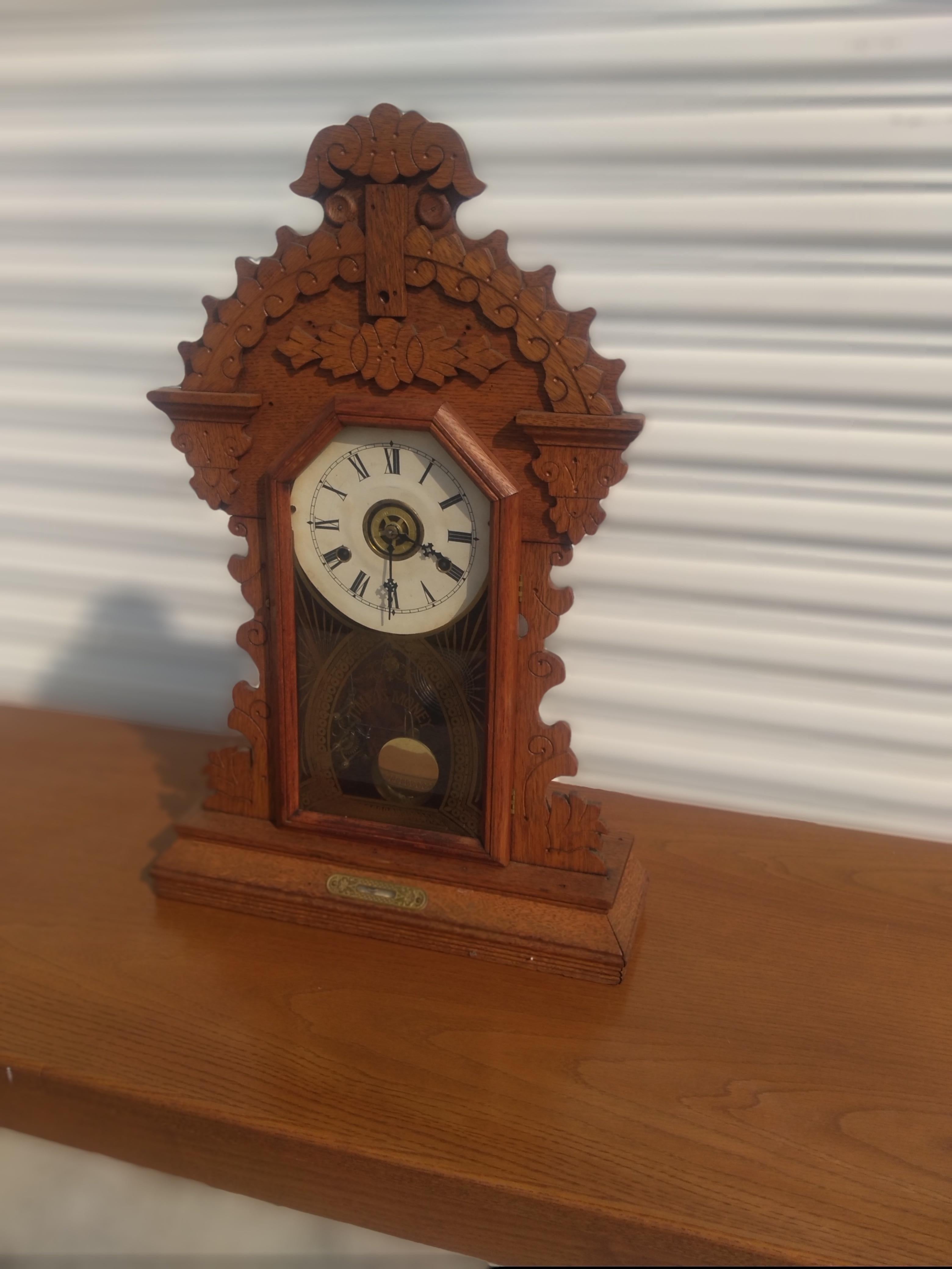 Glass Walnut Late 19th Century Gingerbread Mantle Clock For Sale