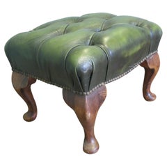 Chesterfield Bibliothekshocker aus Nussbaum und Leder.