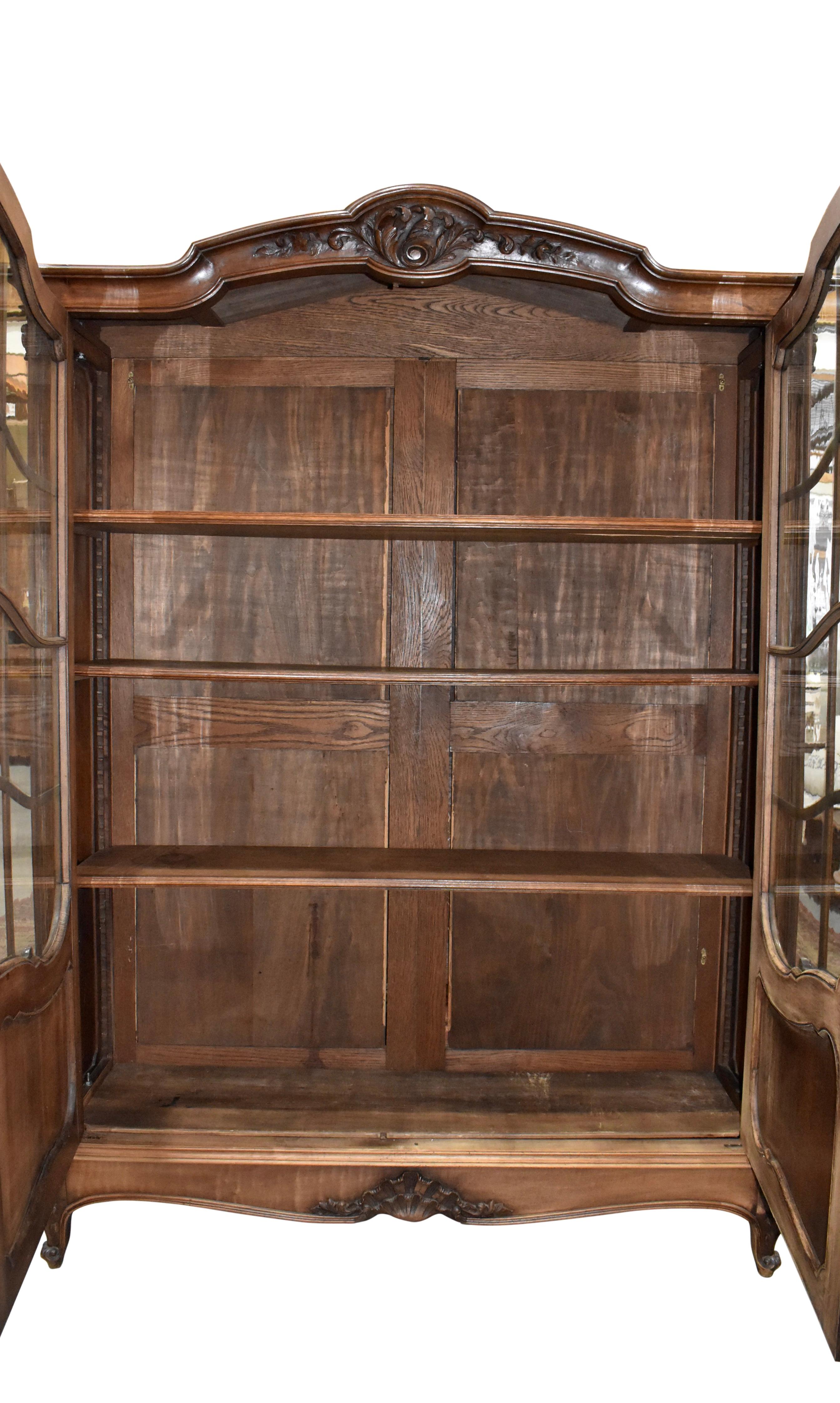 Carved Walnut Louis XV Bookcase with Glass Doors, circa 1890 For Sale