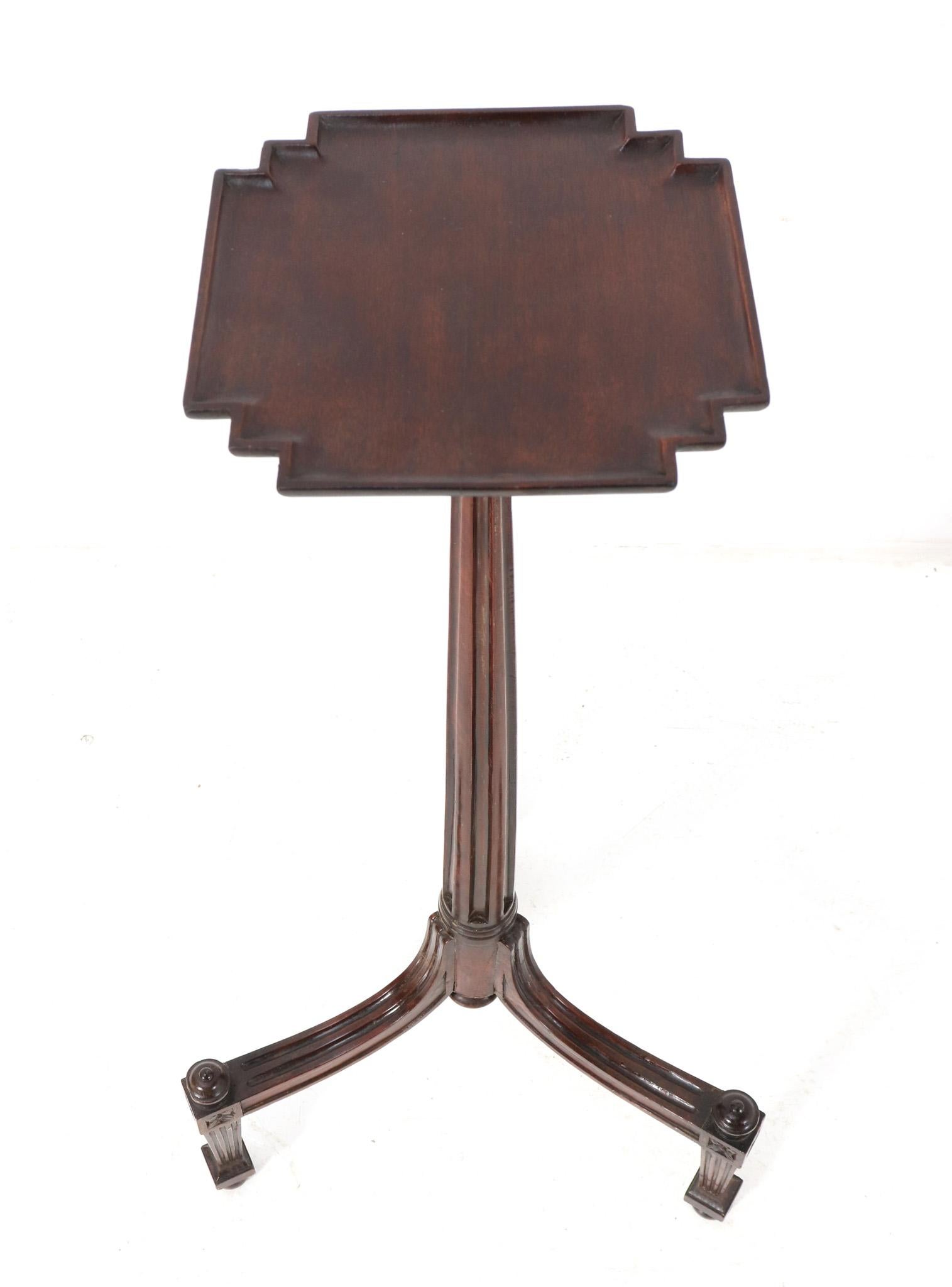 Stunning and elegant Louis XVI Style side table or plant stand.
Striking Dutch design from the 1900s.
Solid walnut tripod base with original solid walnut top.
Measurements top diameter: 22.5 cm or 8.86 in.
This wonderful Louis XVI style side