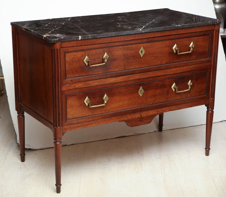 Walnut Louis XVI two-drawer commode with round fluted side supports ending in tapering legs and St. Laurent marble top.


Available to see in our NYC Showroom 
BK Antiques
306 East 61st St. 2nd fl.
New York, NY 10065