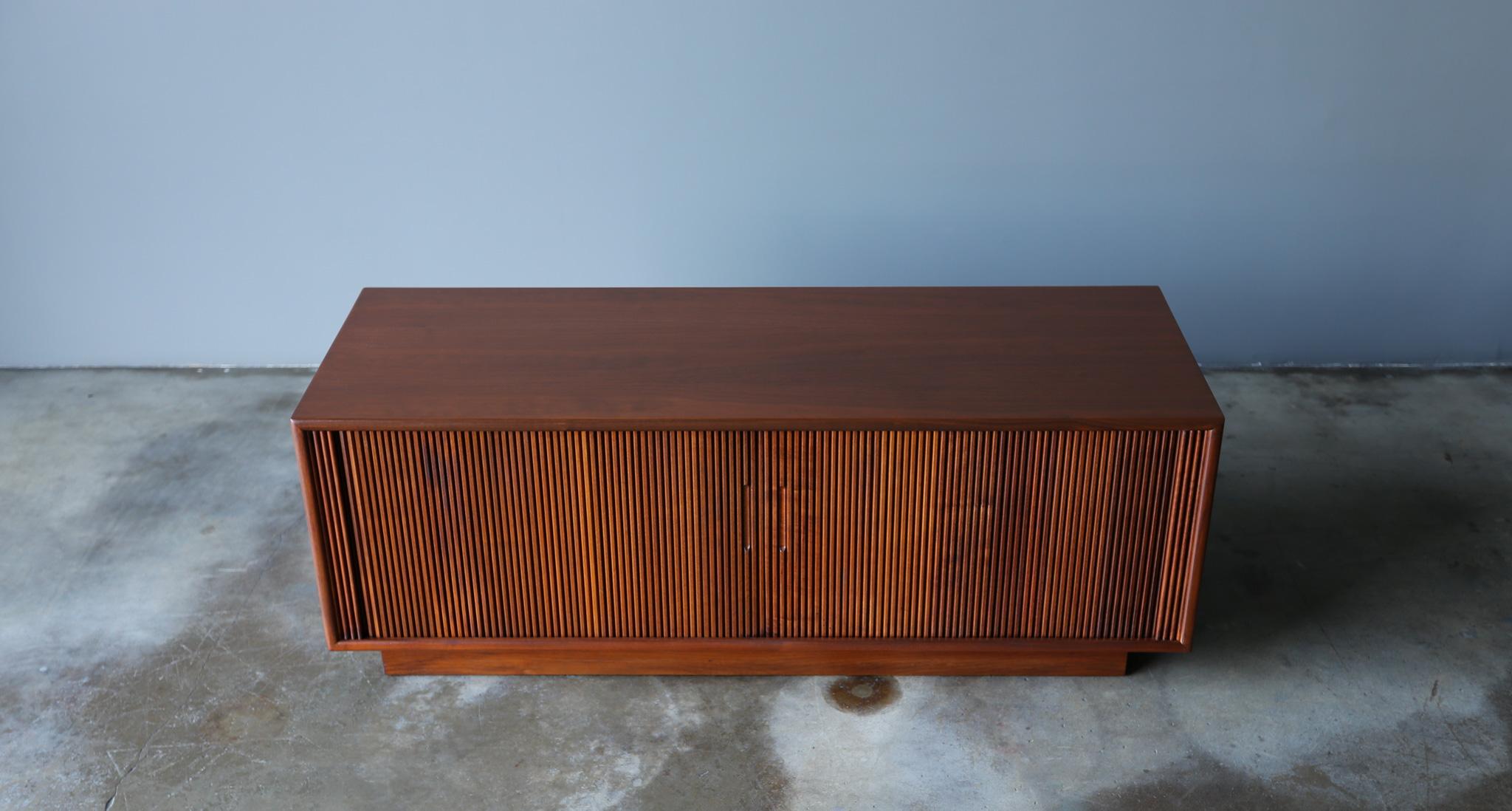 Walnut Low Profile Tambour Door Credenza, United States, c.1965.  This piece has been professionally restored.  