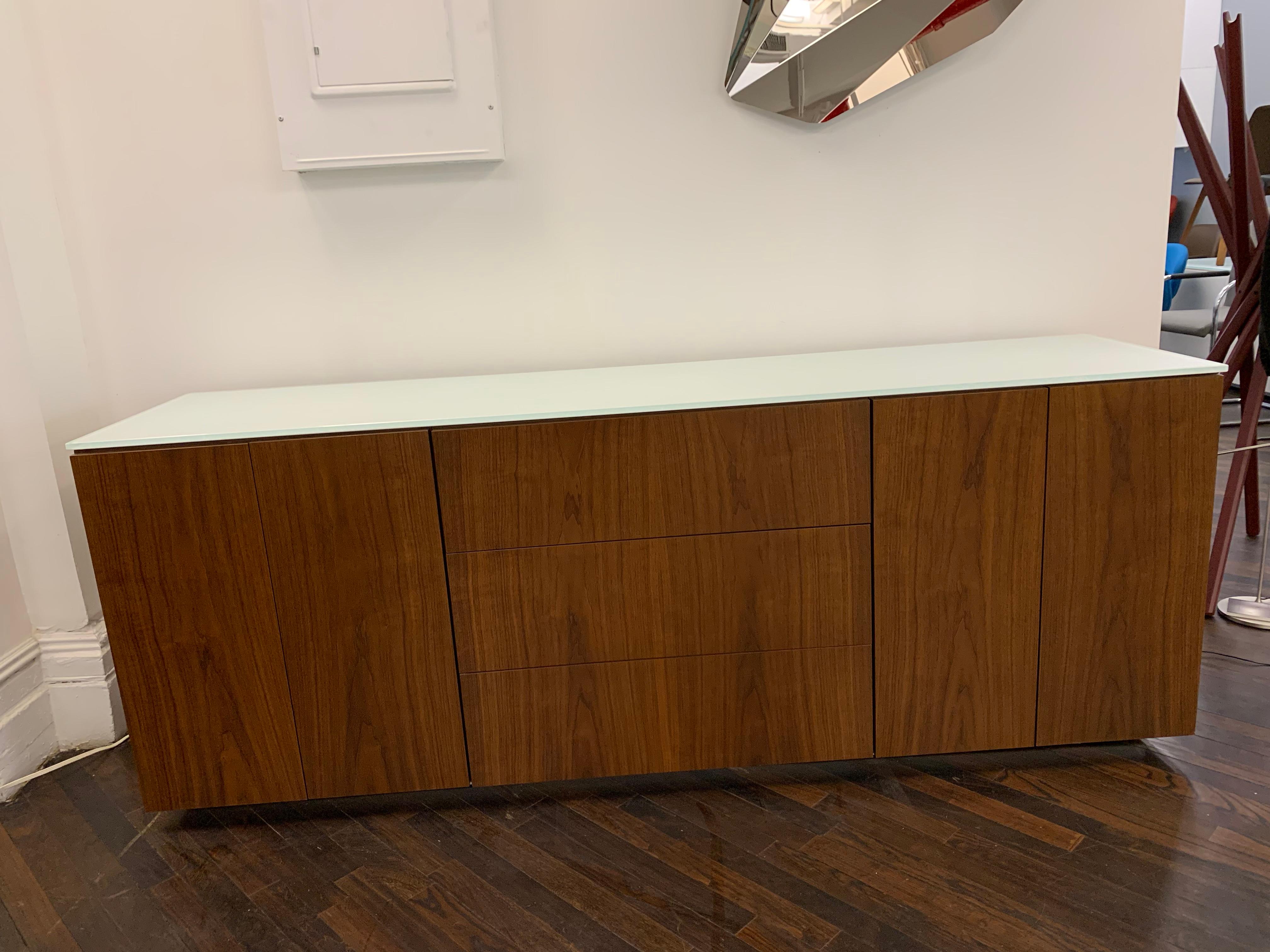 Walnut veneer with matte white glass top
Measures: 78 x 25 x 25” H.