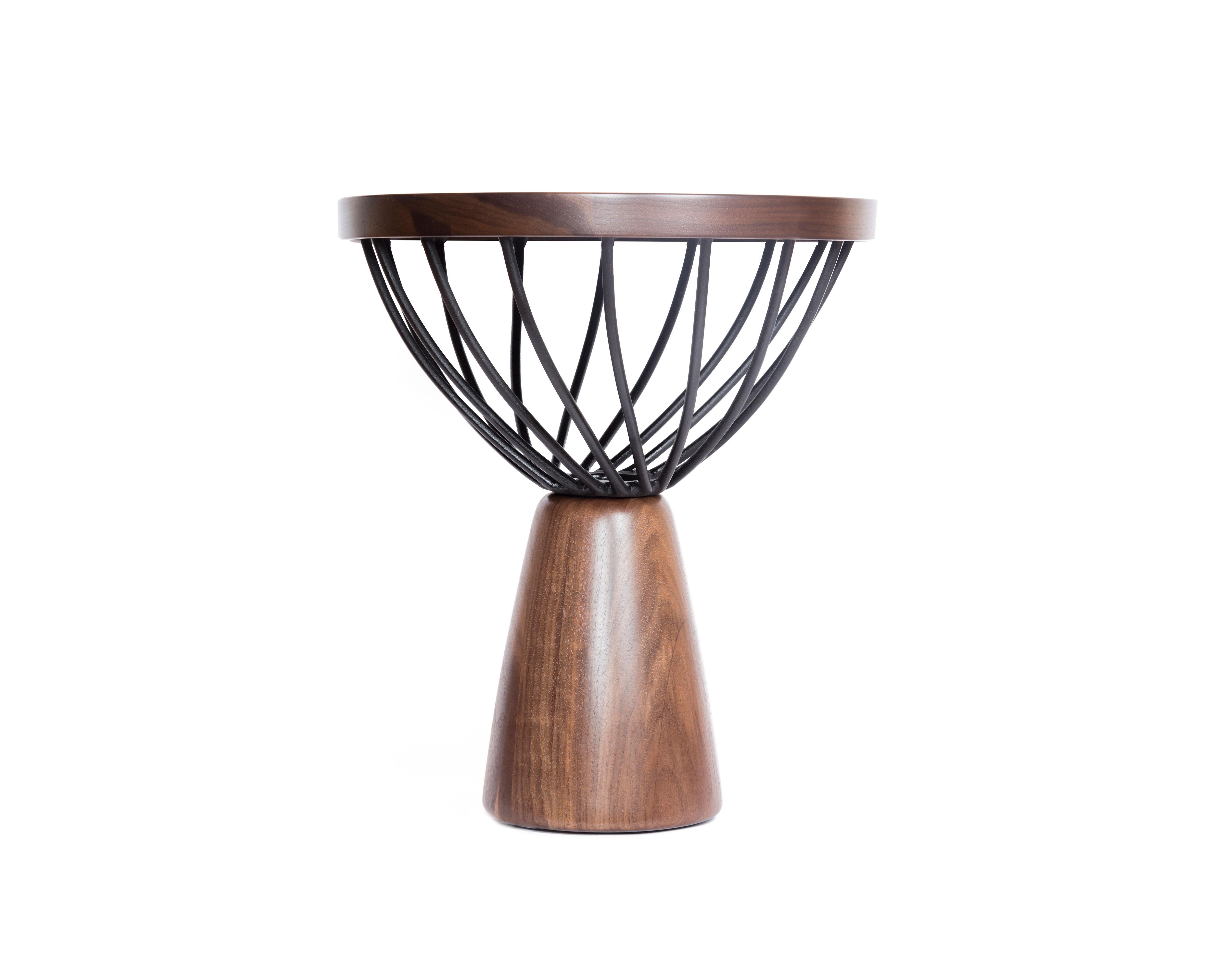 The Talking Tables were inspired by the West African Talking Drum. The Talking Drum has the ability to mimic human speech and was originally used as a communication tool. It is now commonly used in celebrations such as birthdays and weddings.
These