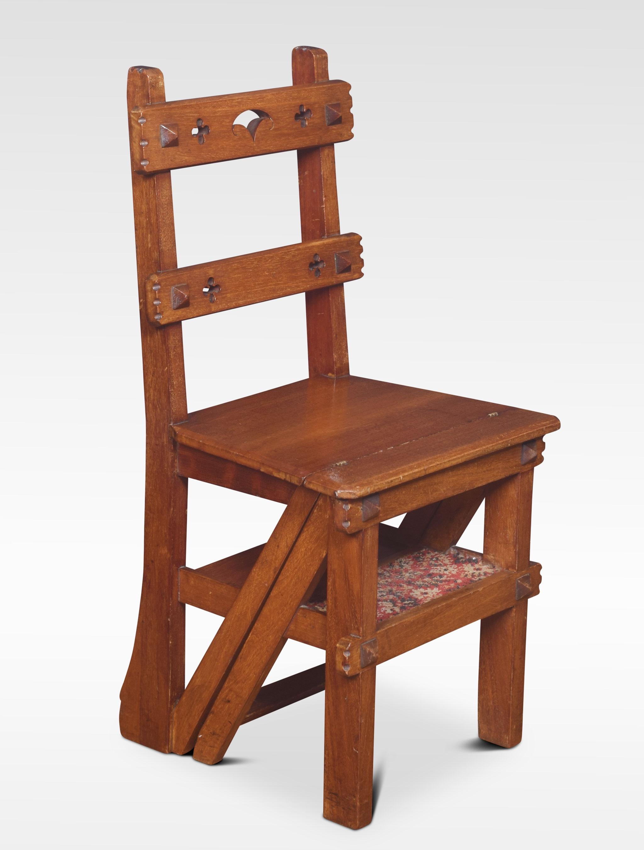 19th century walnut metamorphic chair, with pierced back above solid seat the chair opens into a sturdy set of library steps.

Dimensions:
Height 35 inches height to seat 17.5 inches
Width 18 inches
Depth 17 inches.