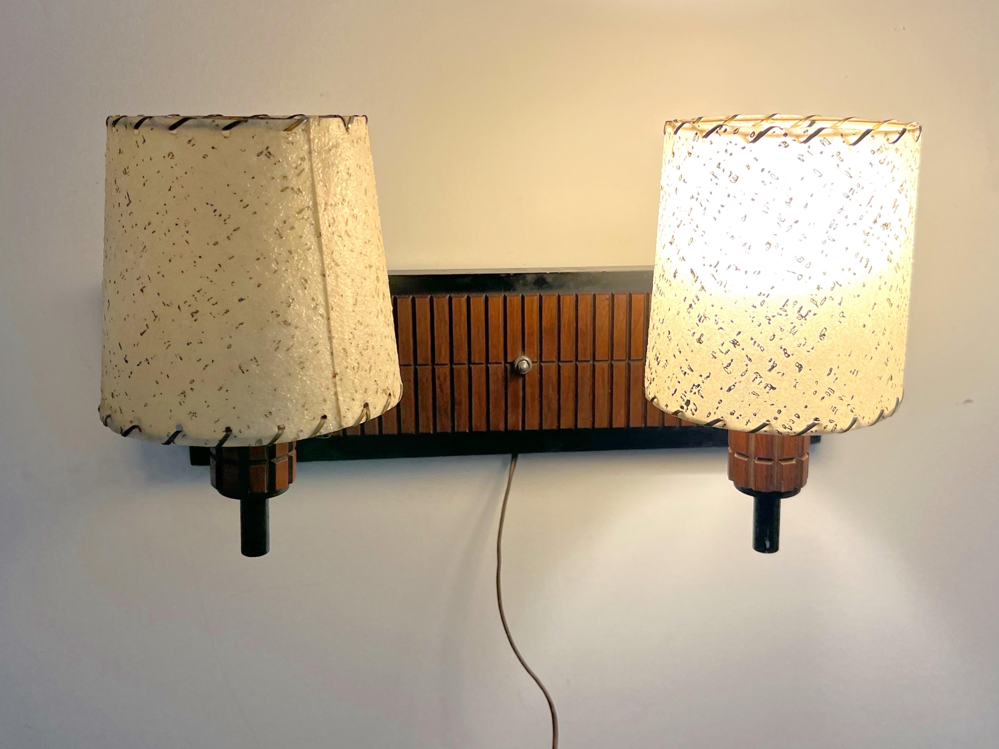 Vintage Double Wall Sconce in Walnut and Metal With Fiberglass Shades.  Great for a reading nook. 
The measurements below are with the shades on.