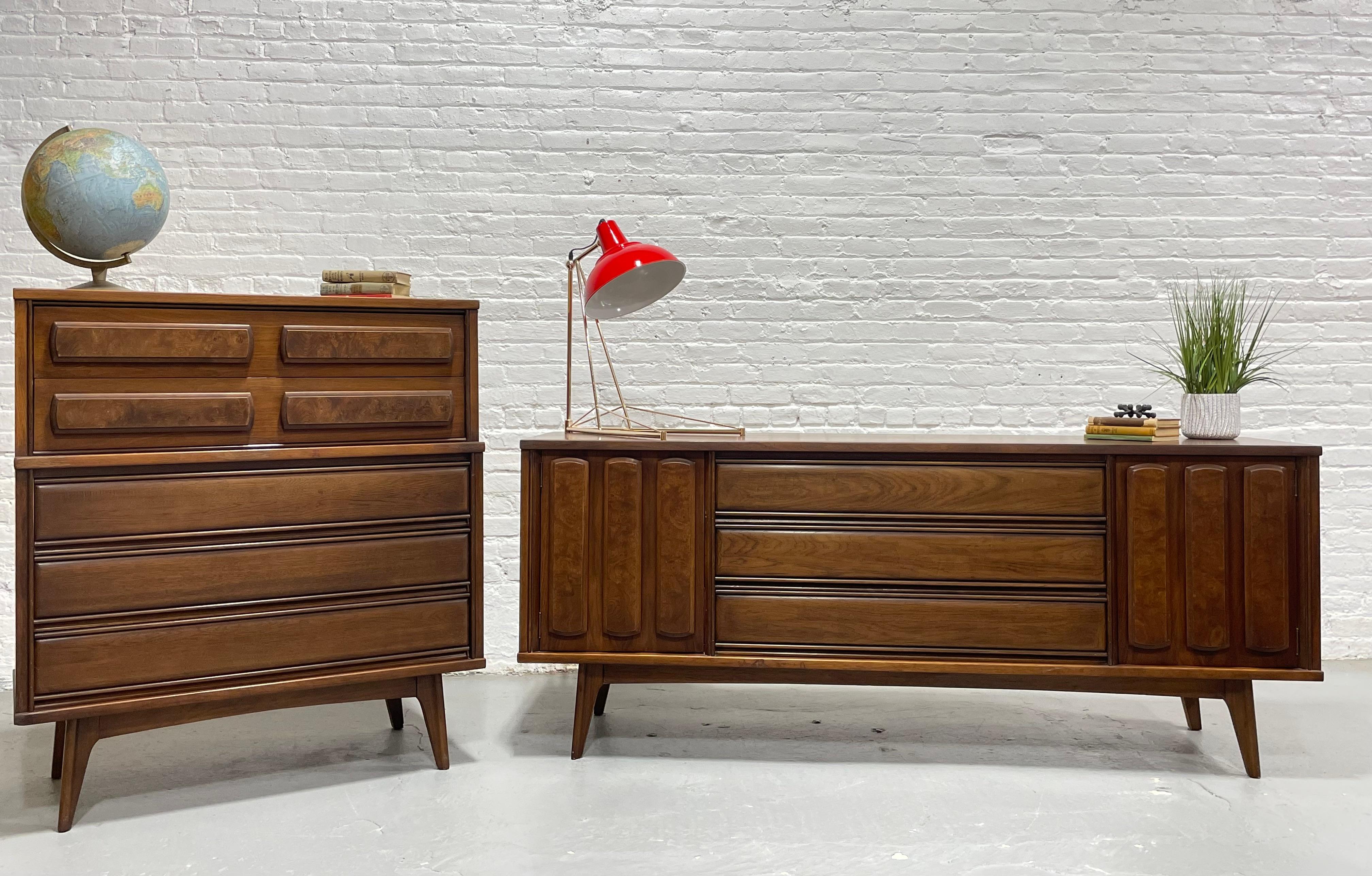 Gorgeous Walnut Mid Century Modern Bedroom Set consisting of a long dresser and highboy, c. 1960's.

Walnut Mid Century Modern Burled Dresser / Credenza, c. 1960's. This sideboard offers unique a ton of functional storage - 9 deep and spacious