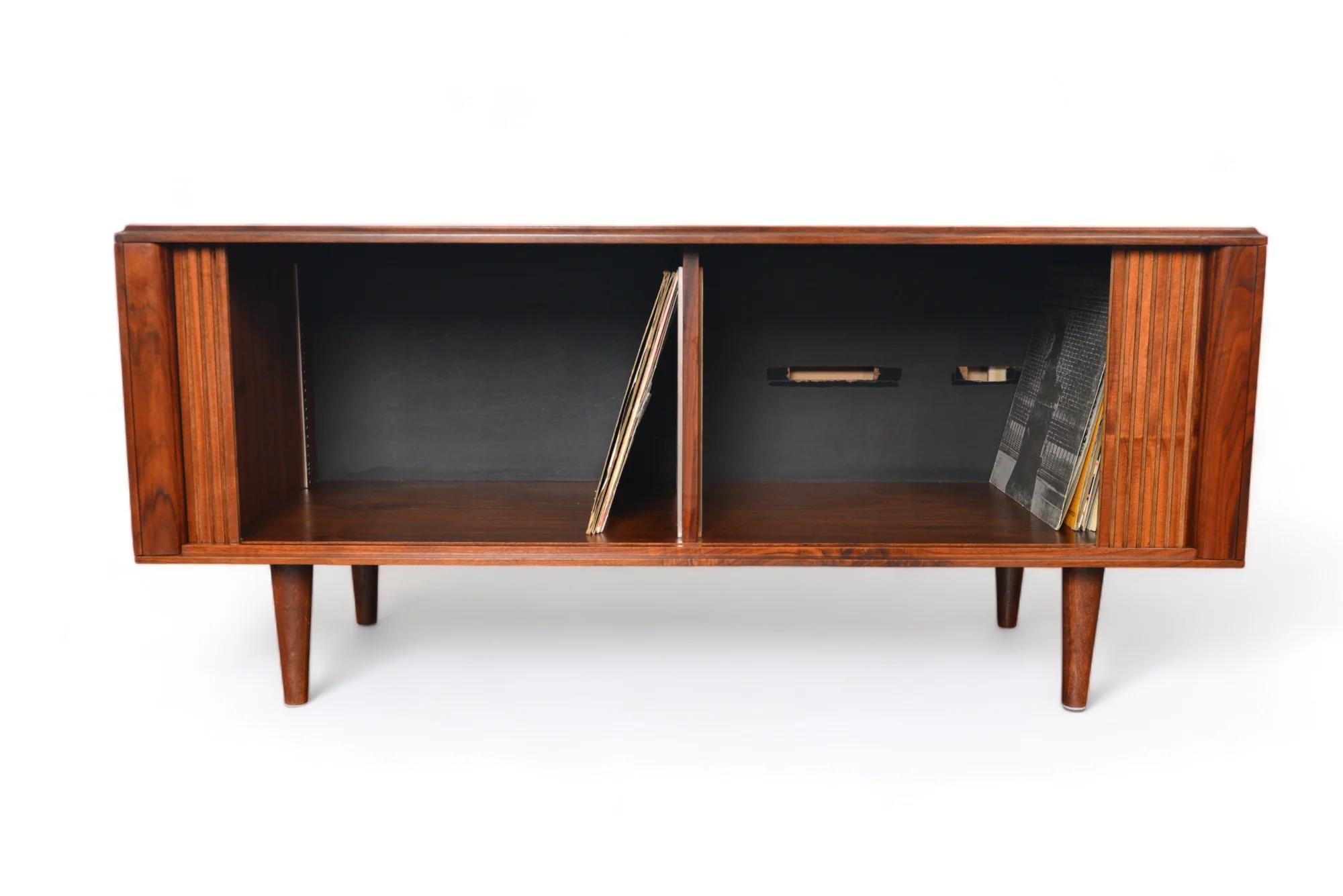 Origin: Denmark
Designer: Unknown
Manufacturer: Brown & Saltman
Era: 1960s
Materials: Walnut
Measurements: 48