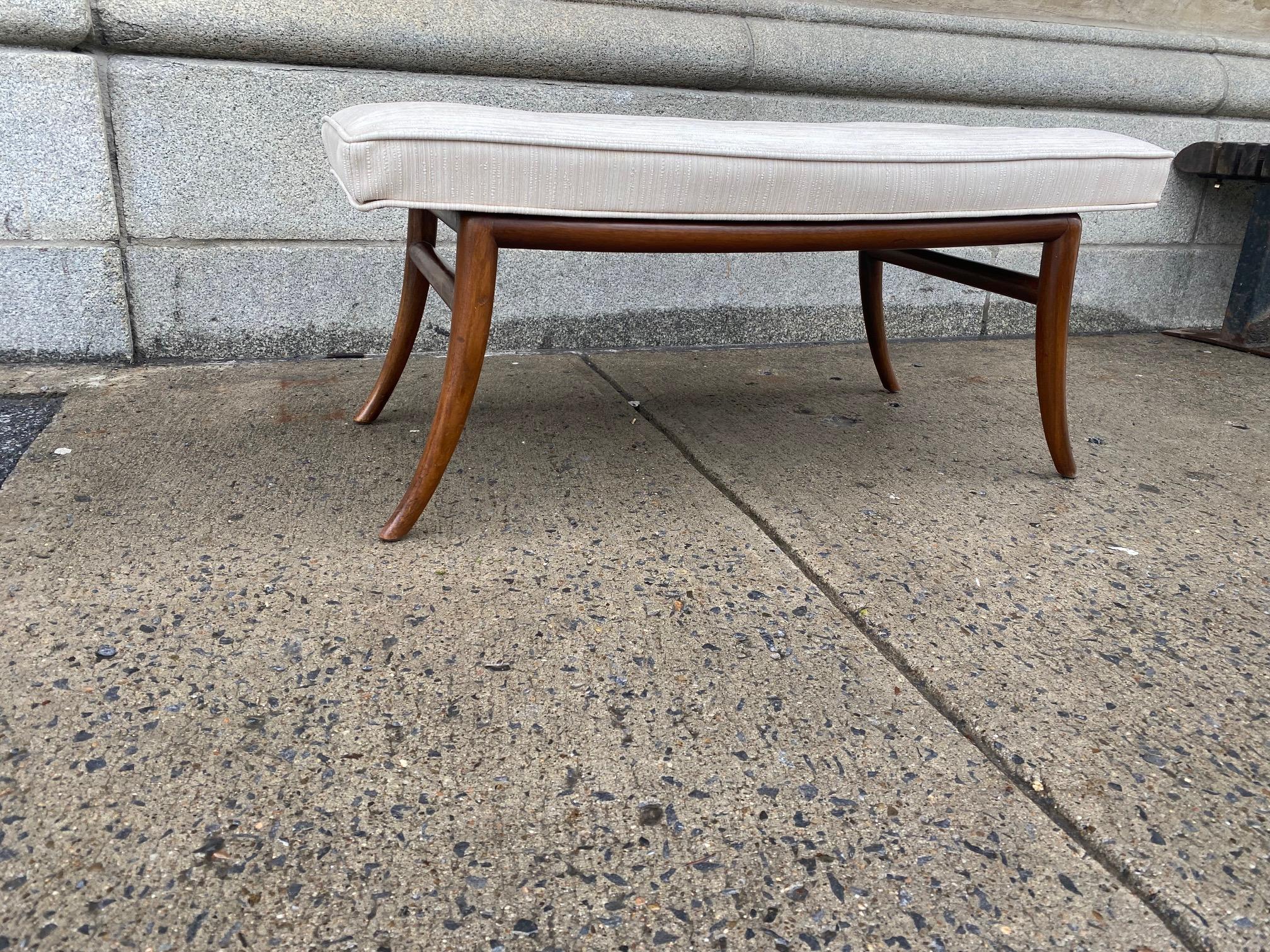 Walnut modernist bench by Robsjohn Gibbings for Widdicomb with sabre feet. 
Bearing sticker Widdicomb.