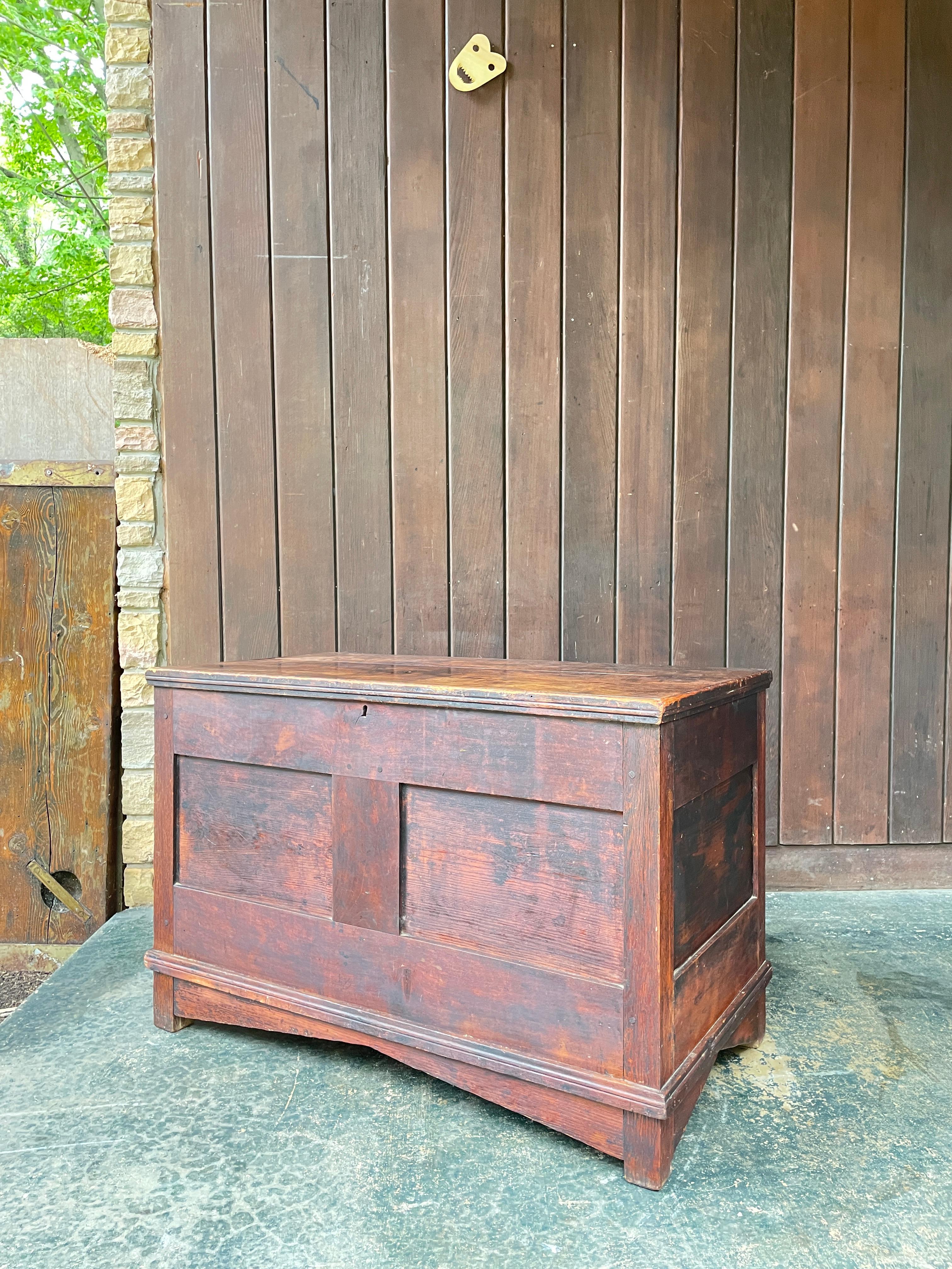 This trunk appears to be crafted of Oak supports, Pine wall panels, and a Walnut lid.  Understated geometry, interesting angular skirting, overall it has a nice minimal mission influence.  From a Maryland estate, trunk appears to be early 20th or