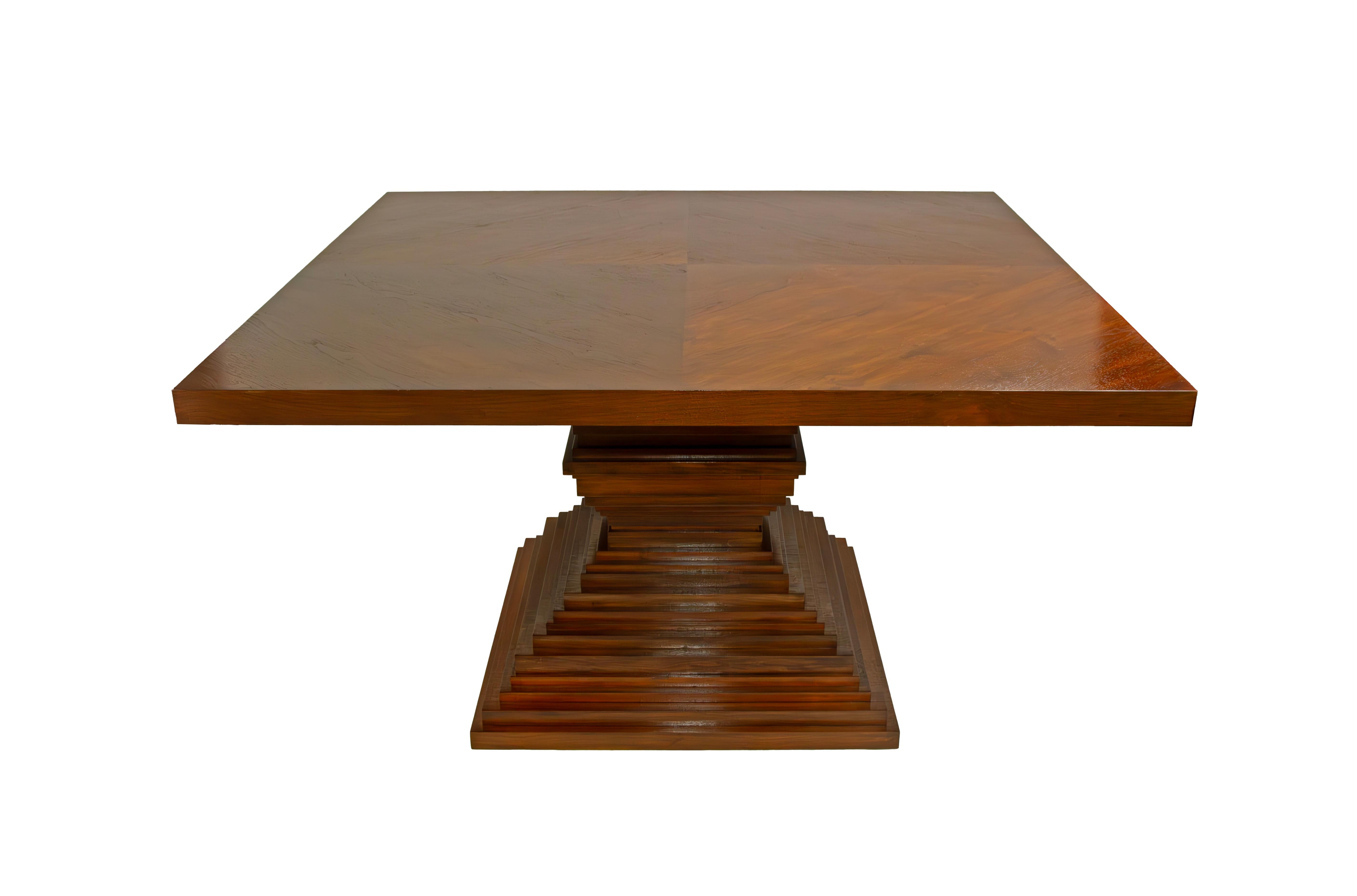 Une table de salle à manger fabriquée à la main. La table originale est composée avec art de 29 disques individuels ; l'impressionnant plateau est constitué de multiples sections de noyer ou de palissandre, créant un splendide éclat de soleil. La