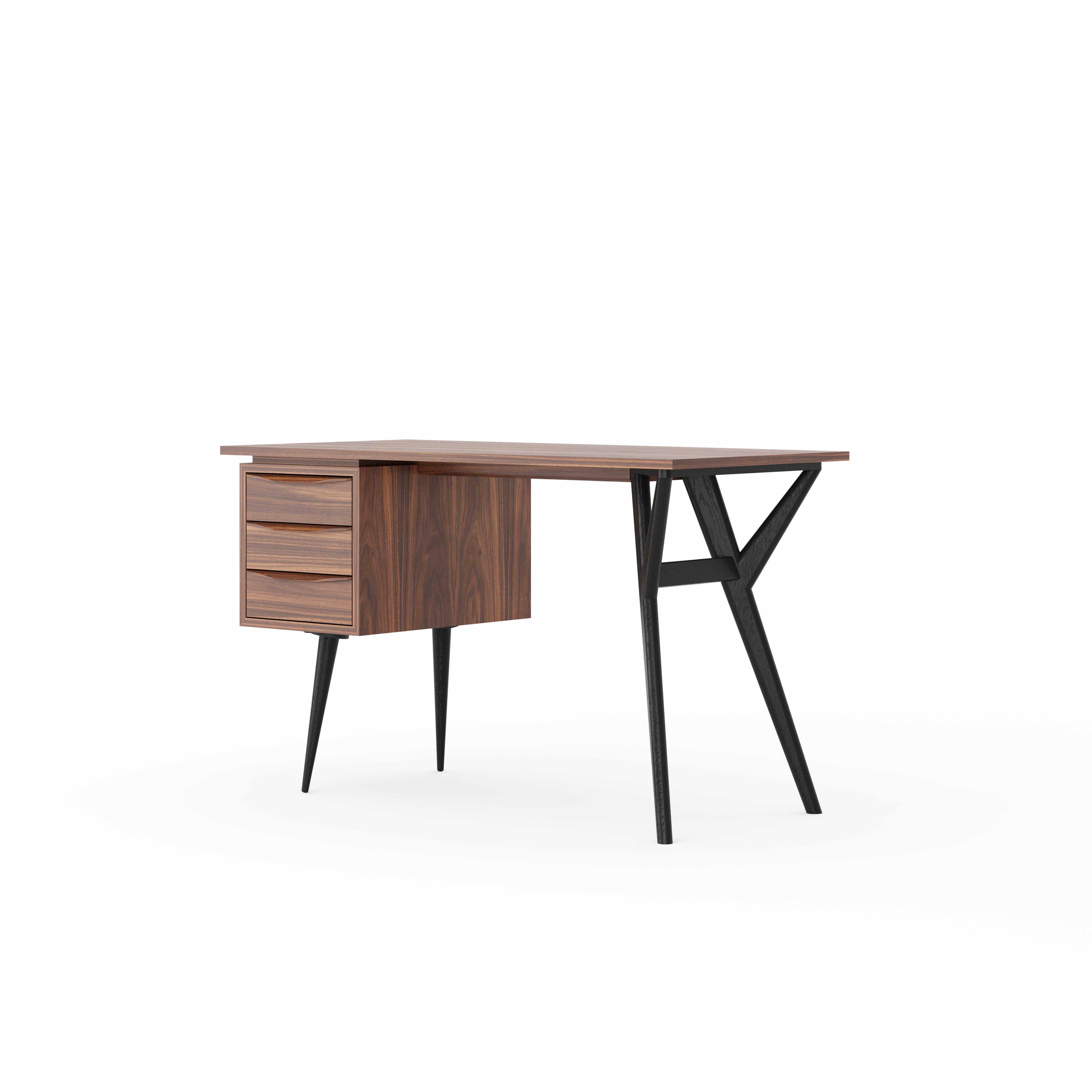 Walnut office desk in mid century style with organic shape black legs and three drawers. Perfect as an office desk, study desk, writing desk, computer desk.
Three drawers guarantee a large amount of storage space. High quality desk made of wood