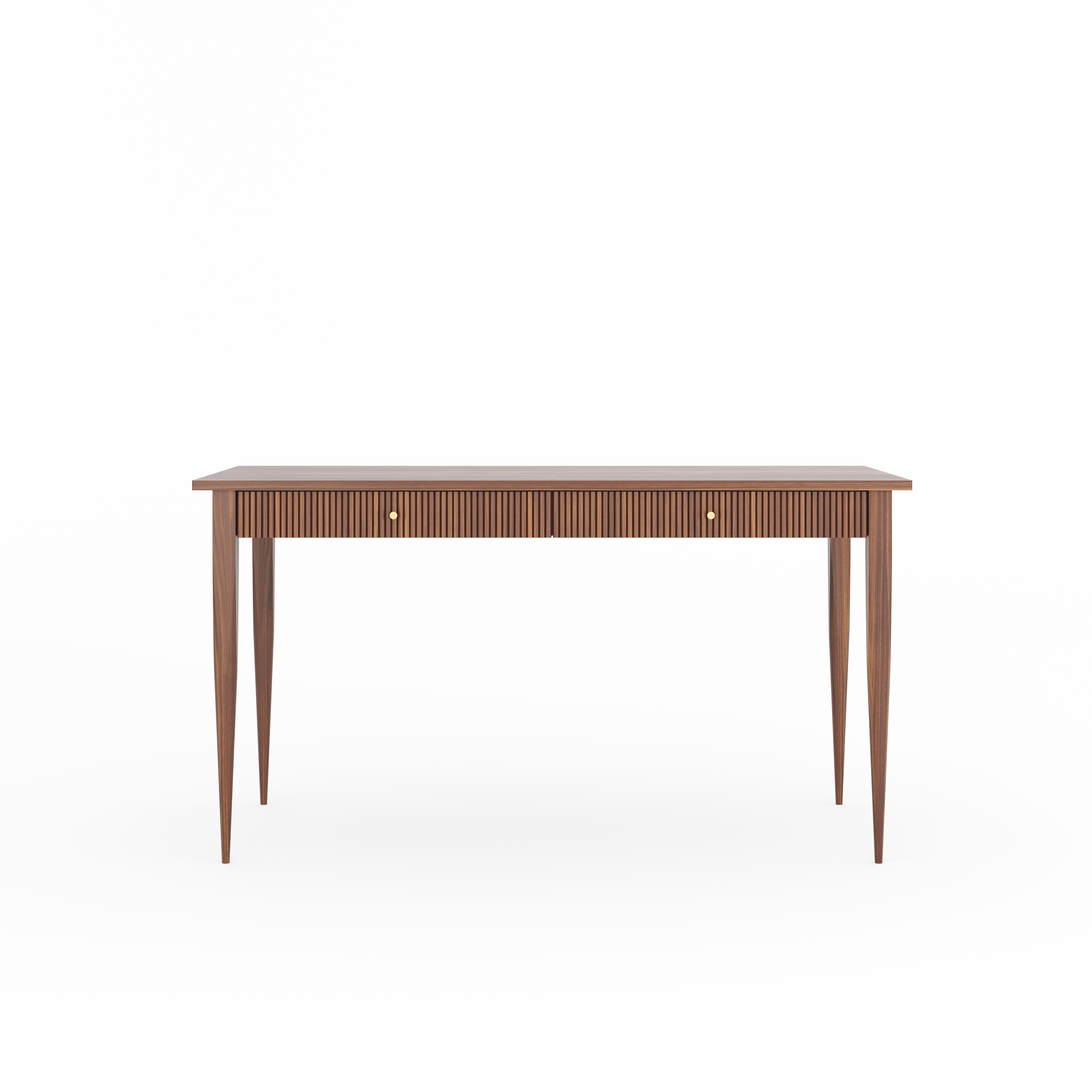 Walnut office desk in mid century style with two drawers and slatted fronts. Drawers fronts are made of slatted walnut wood with brass handles. The legs are square at the top and then rounded at the bottom. Desk, made of solid walnut wood and wood