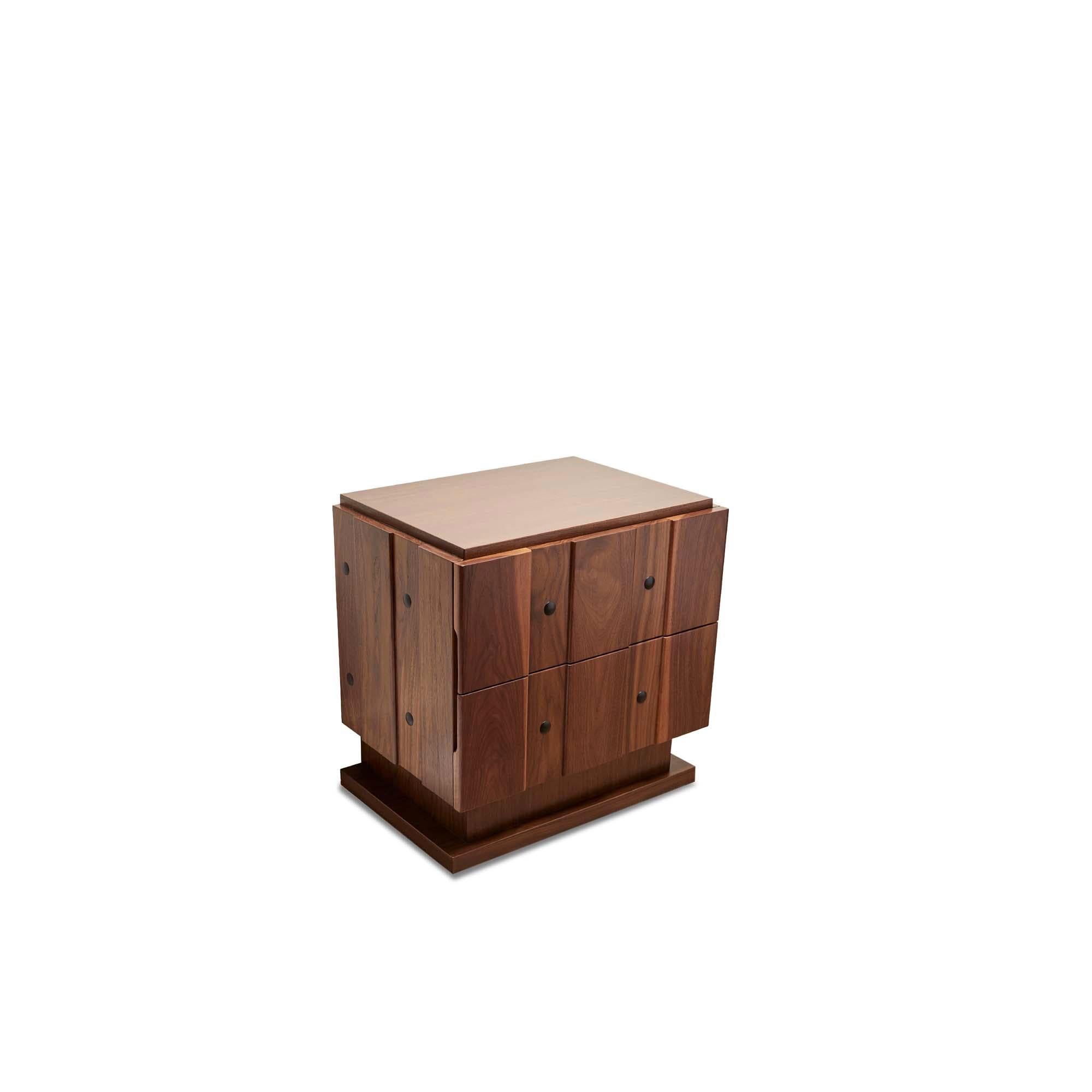 The Ojai Nightstand features board and batten doors with iron details and two drawers. Available in two sizes and in American walnut and white oak.

Inspired by the refined simplicity and subtle detailing of early 20th century Swedish furniture