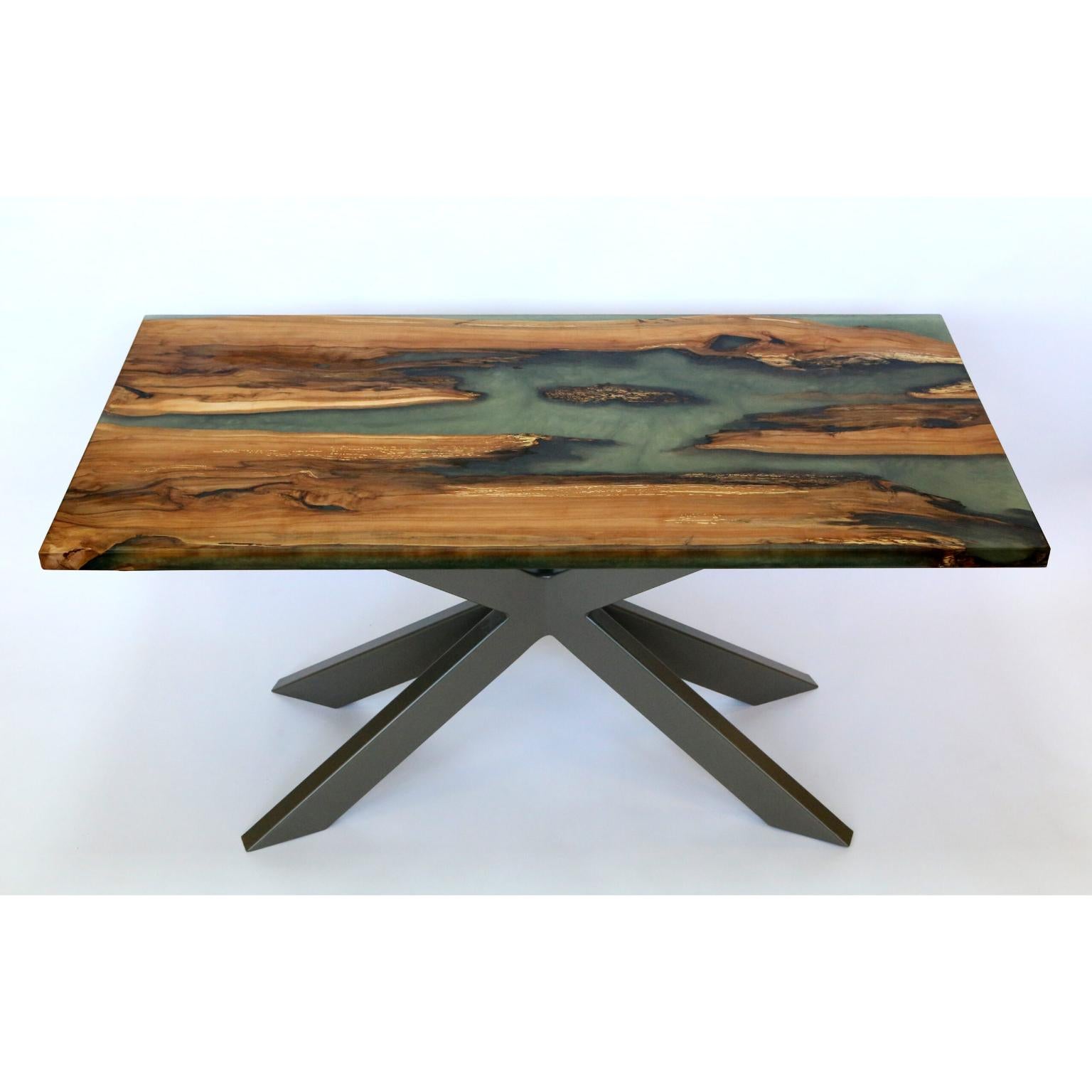 Walnut On Nile Dining Table by KV Design
One Of A Kind
Dimensions: D 80 x W 160 x H 74 cm.
Materials: European walnut, metal, and epoxy.

Everything is custom-made 1 of 1 edition. Please contact us.

The dining table is an essential part of your