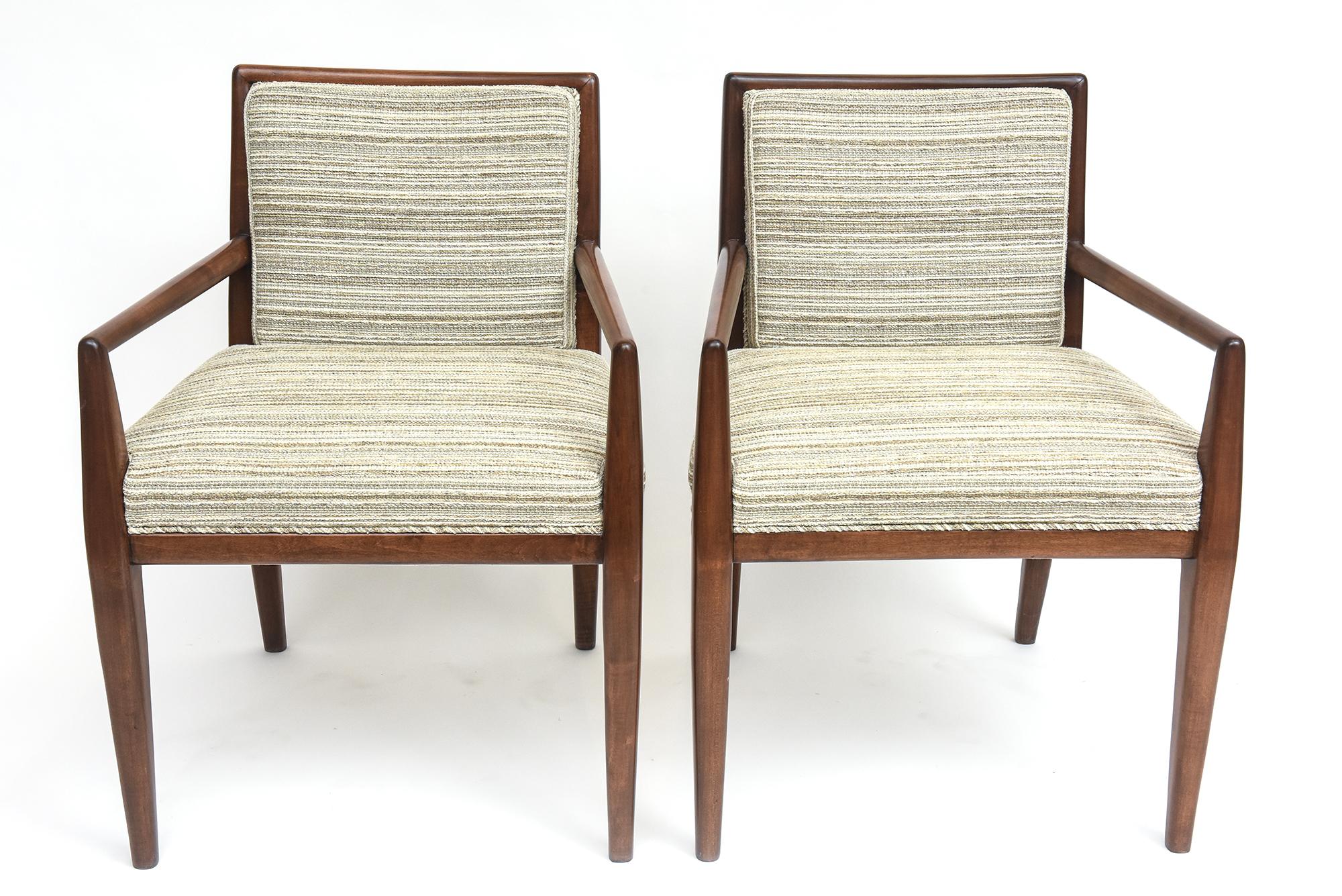 Newly upholstered solid walnut armchairs by T. H. Robsjohn-Gibbings for Widdicomb Furniture, circa 1950. Two available, priced and sold individually at $3200 each.