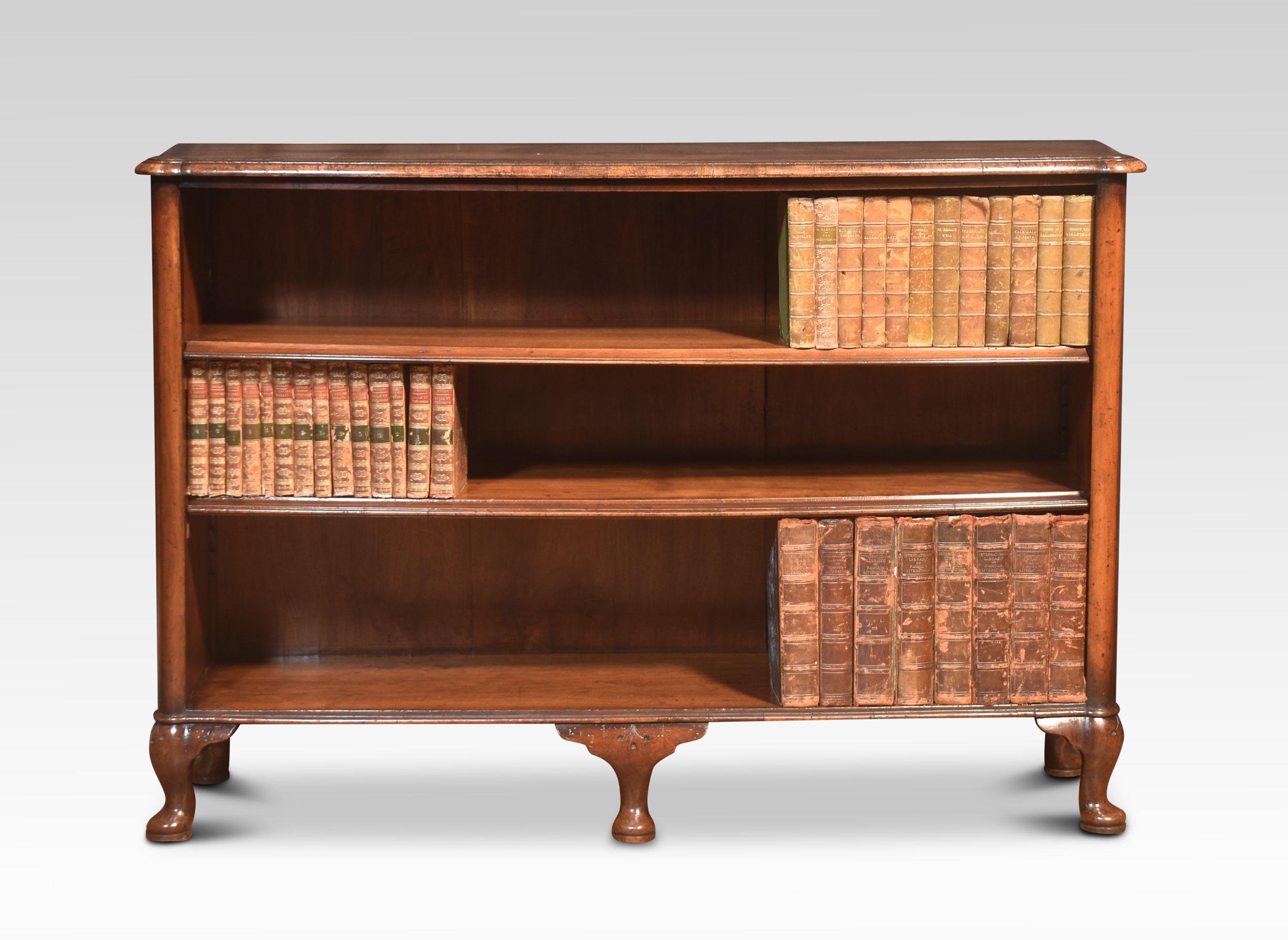Walnut open bookcase, the rectangular well-figured cross banded bow fronted top above-moulded frieze to the adjustable shelved interior, all raised up on cabriole legs.
Dimensions
Height 34 Inches
Width 50.5 Inches
Depth 15.5 Inches