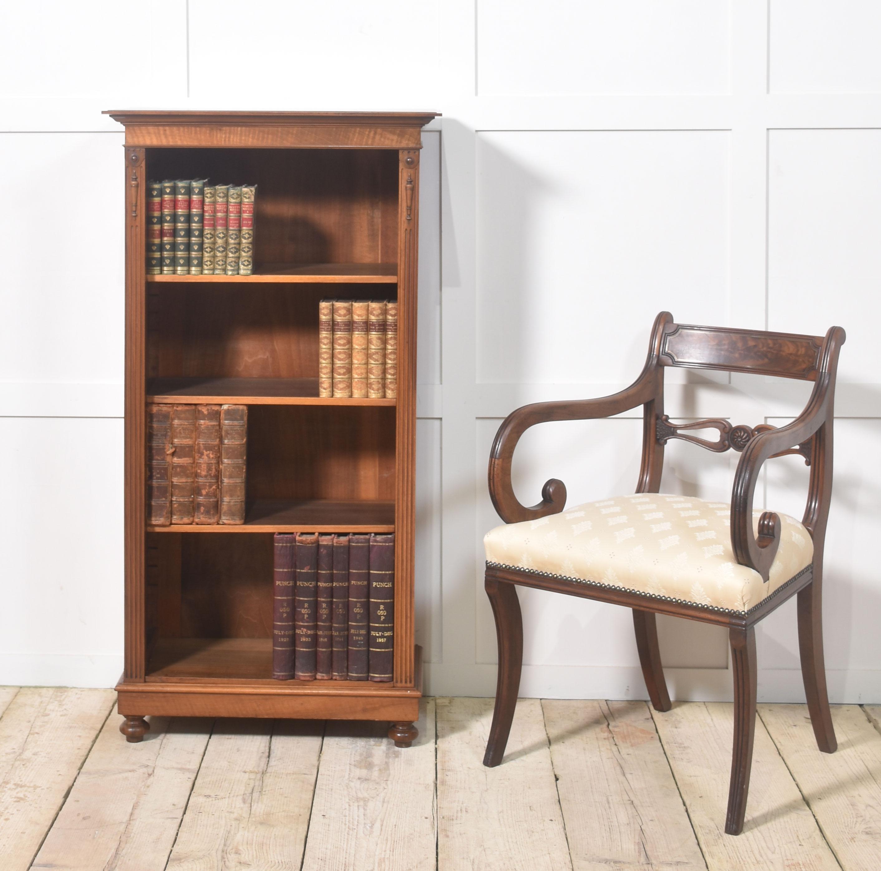 Walnut open bookcase the rectangular top with moulded edge above adjustable shelved interior, flanked by reeded columns. All raised on a plinth base and turned feet.
Dimensions
Height 49.5 Inches
Width 26 Inches
Depth 13.5 Inches