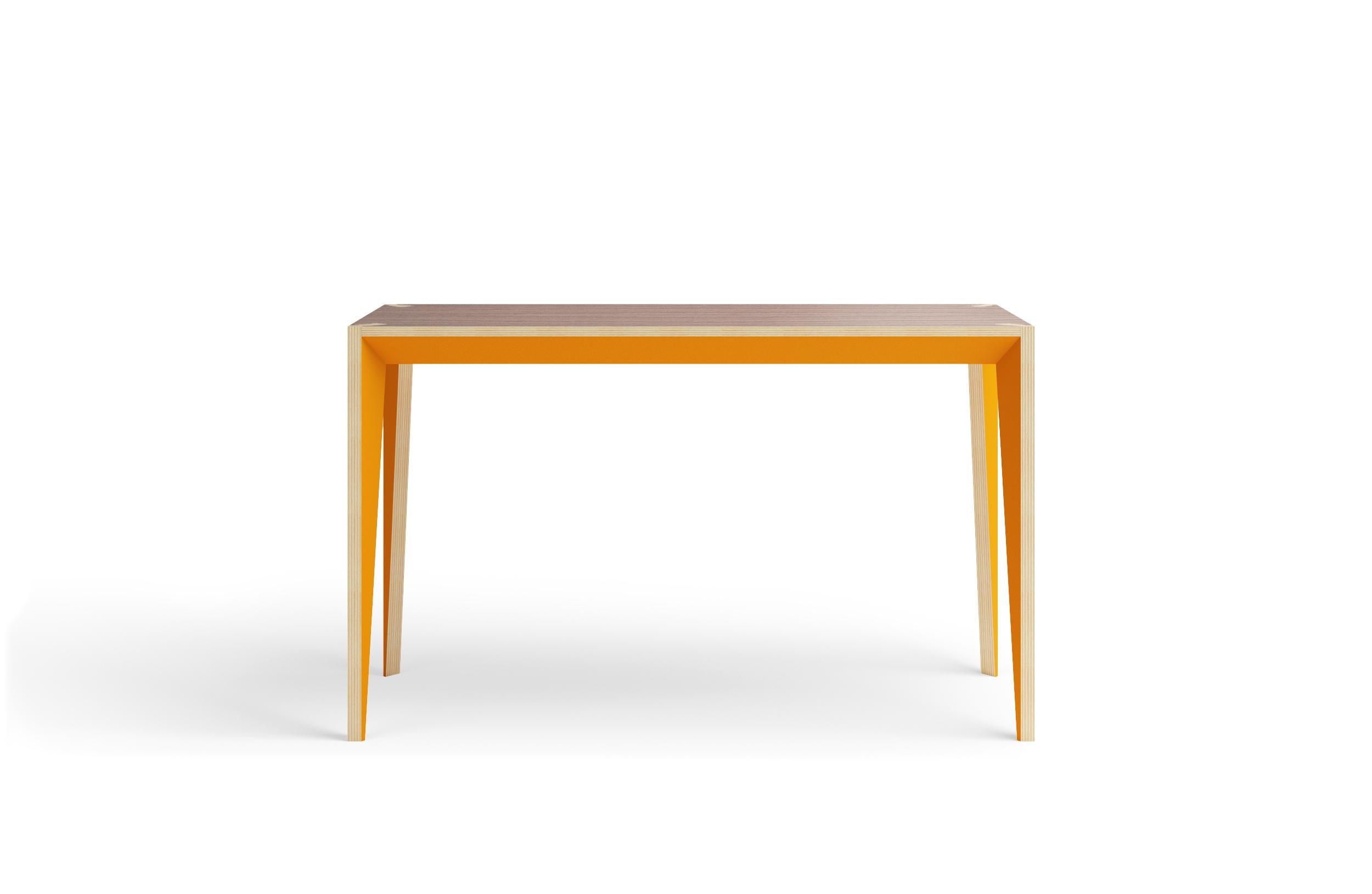 Merging clean lines with warm materials, the faceted geometry of the MiMi console table creates a slender, elegant profile punctuated with painted surfaces that capture light. This modern and graceful design looks great from all angles and can also