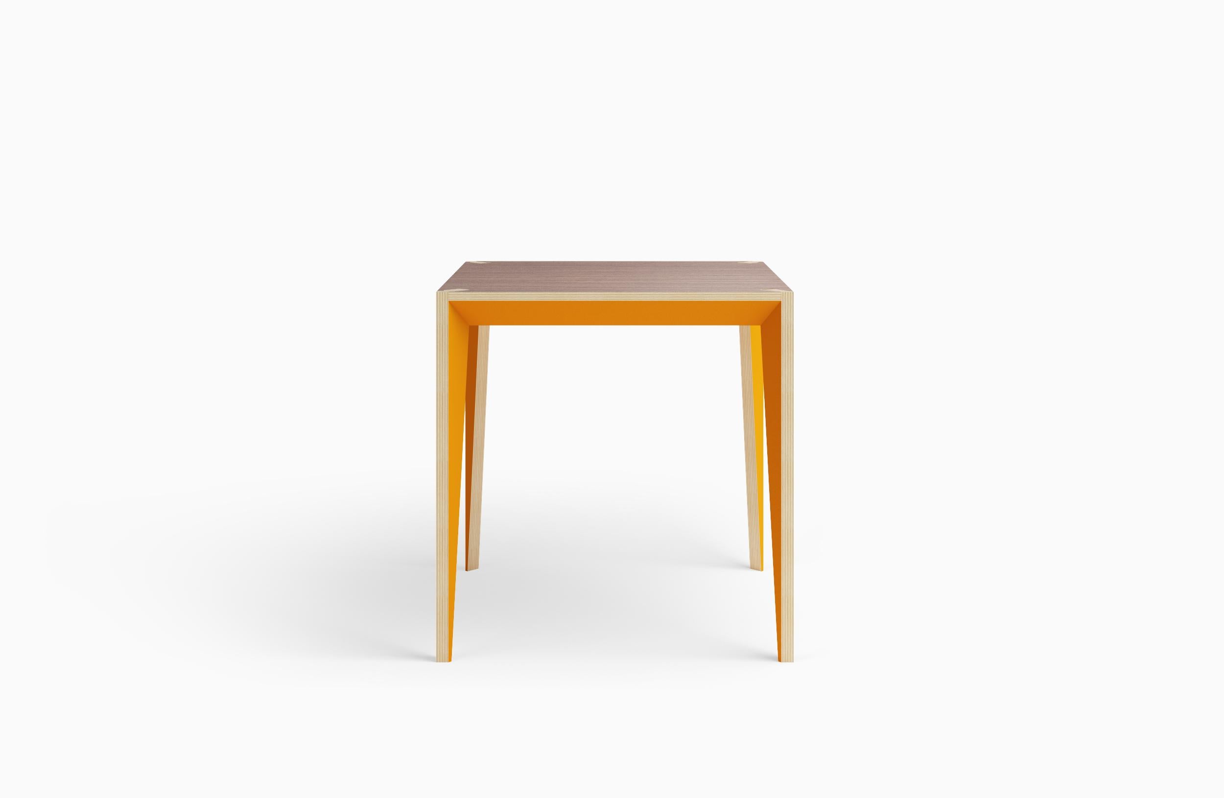 Merging a minimal look with warm materials, the faceted geometry of the MiMi square table creates a slender, elegant profile punctuated with angled surfaces that capture light. The MiMi line was a NYCxDesign 2018 Honoree and German Design Award 2019