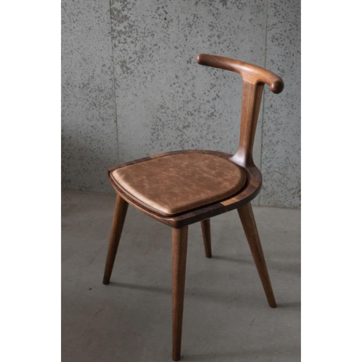 Walnut Oxbend Chair with Leather Seat Pad by Fernweh Woodworking
Dimensions: Seat: W 17” x D 17” x H 16.5” 
Backrest: 29.5” high at center, 30” high on ends
Materials: Walnut, Leather

Wood options: walnut, charcoal ash, white ash.
Upholstery