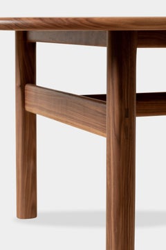 EARL Tavolo da pranzo Palang con piano in noce e bordo in toro