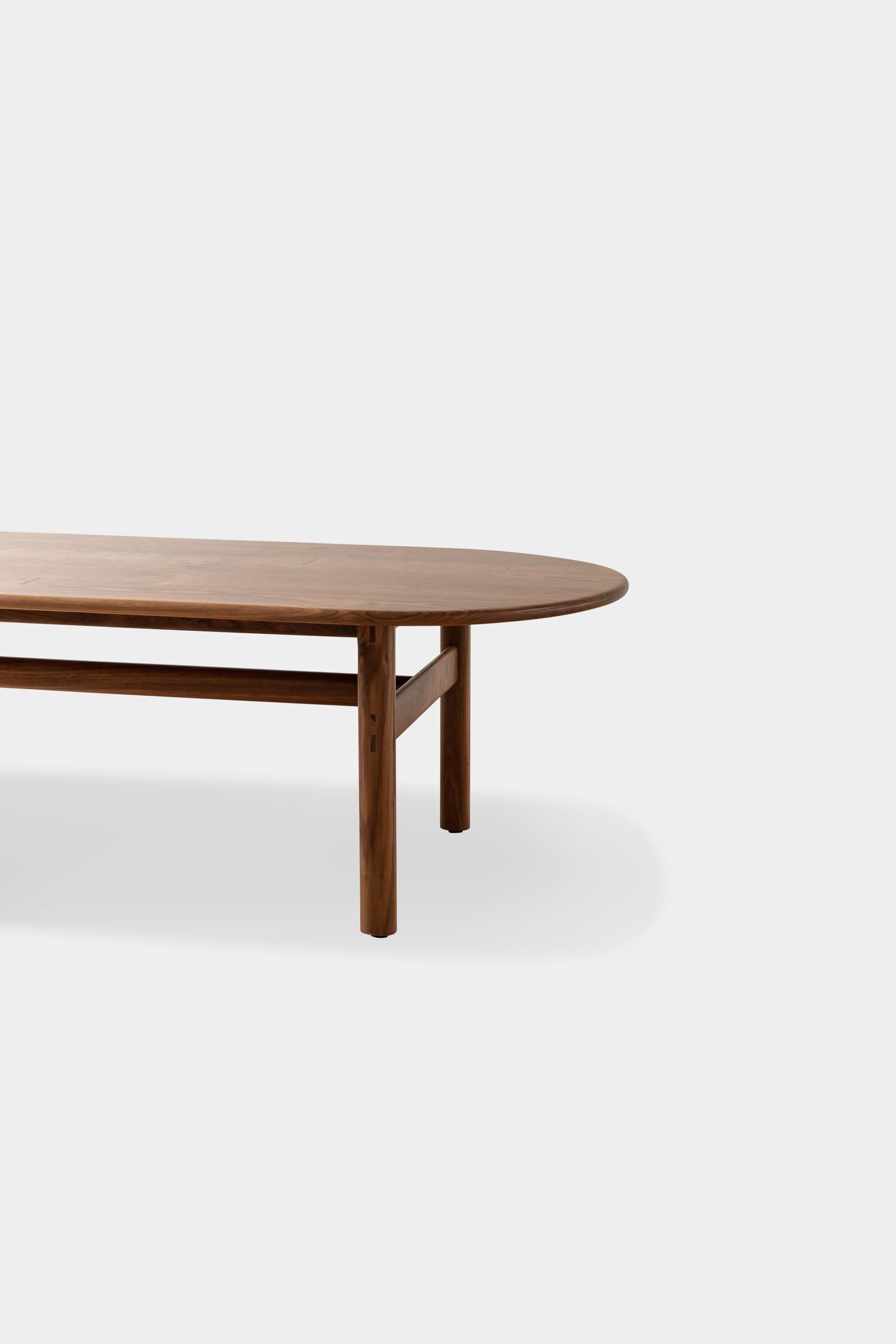 Polished EARL Walnut Pill top bullnose edge Palang Dining Table For Sale