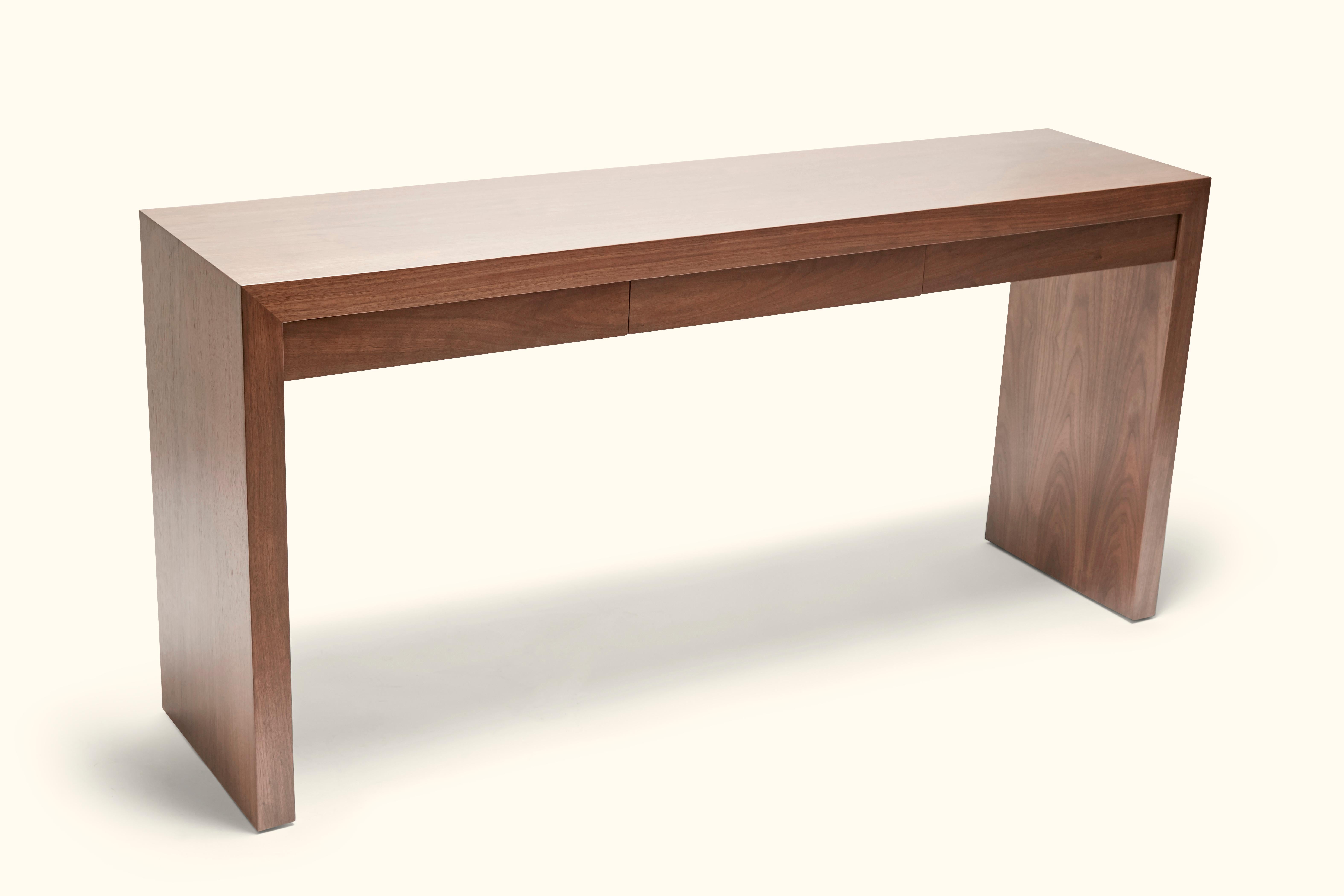 The Parkman console features a classic waterfall design. Shown here in light walnut. Also available with a brushed brass top and sides.

The Lawson-Fenning Collection is designed and handmade in Los Angeles, California.
Message us to find out which