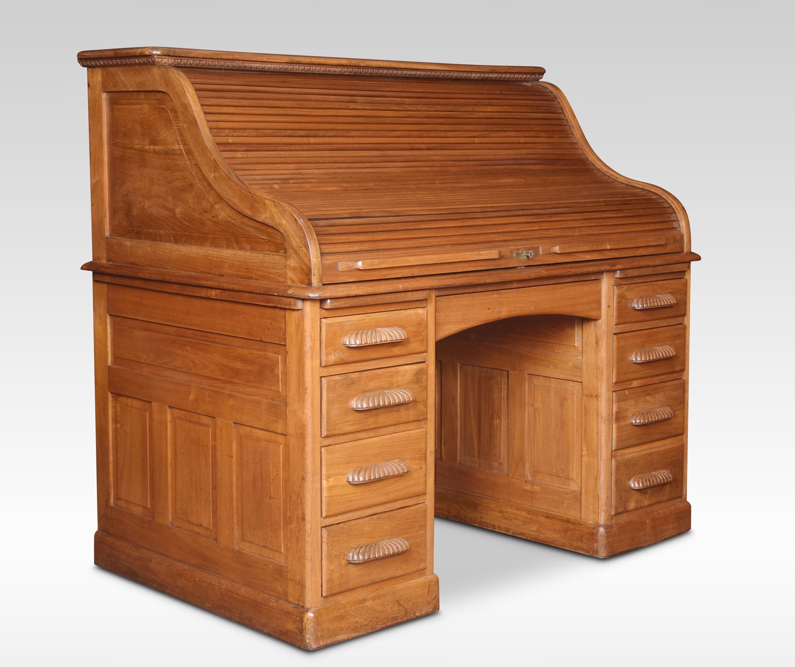 Walnut double pedestal roll-top desk, the high back with fully fitted interior of pigeon holes and drawers. To the base having a center drawer flanked by two pedestals having a brush in slide, one pedestal having four short drawers and the other two