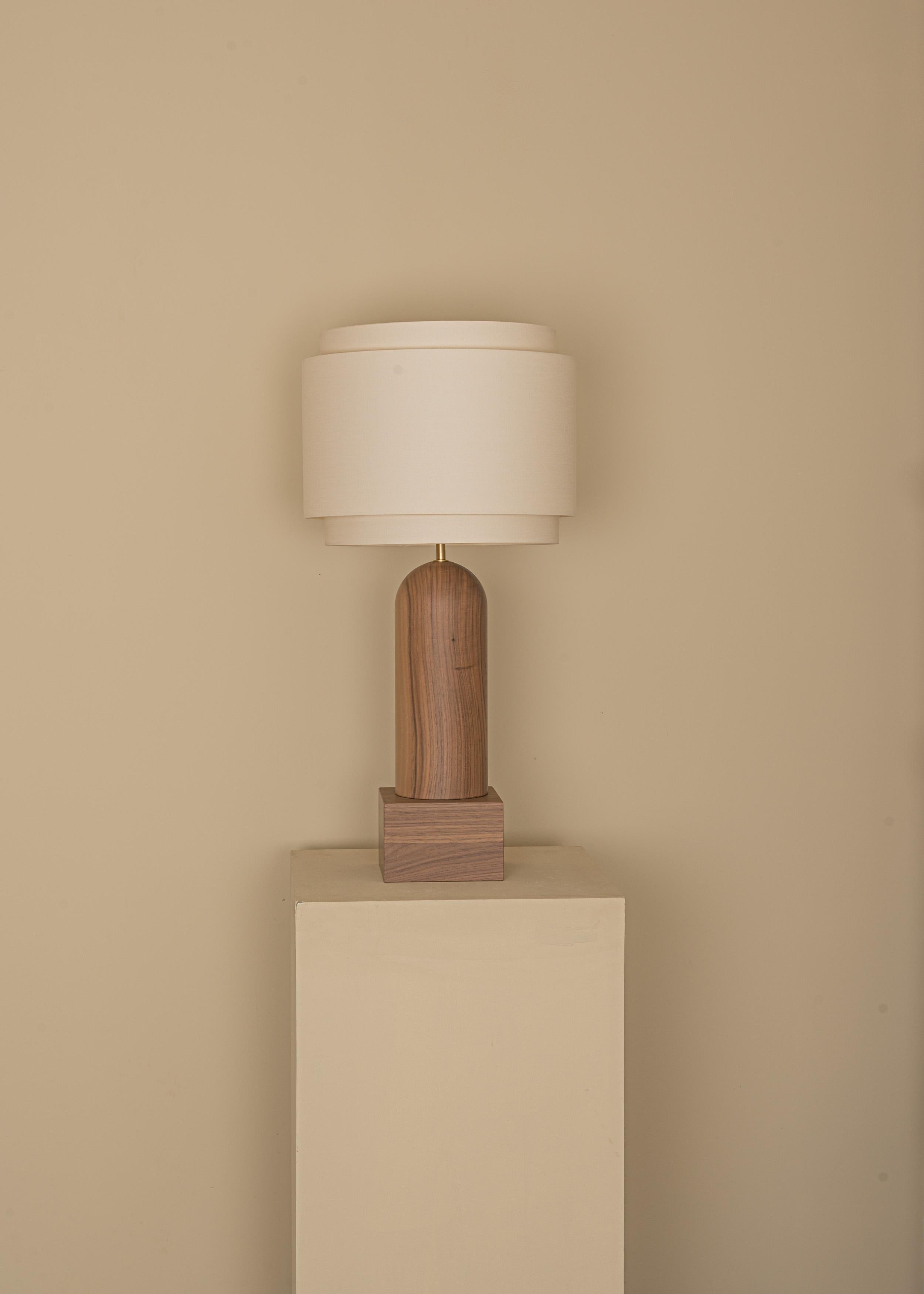 Walnut Pura Kelo Double Table Lamp by Simone & Marcel
Dimensions: D 35 x W 35 x H 69 cm.
Materials: Brass, cotton and walnut.

Also available in different marble, wood and alabaster options and finishes. Custom options available on request. Please