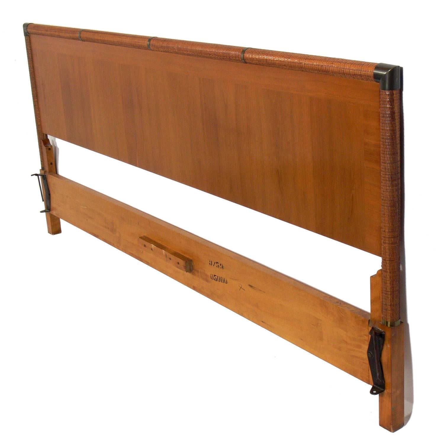 Walnut reed and brass headboard, designed by T.H. Robsjohn-Gibbings for Widdicomb, American, circa 1950s. This head board works with a king-sized bed and can be mounted to most standard bed frames (not included).