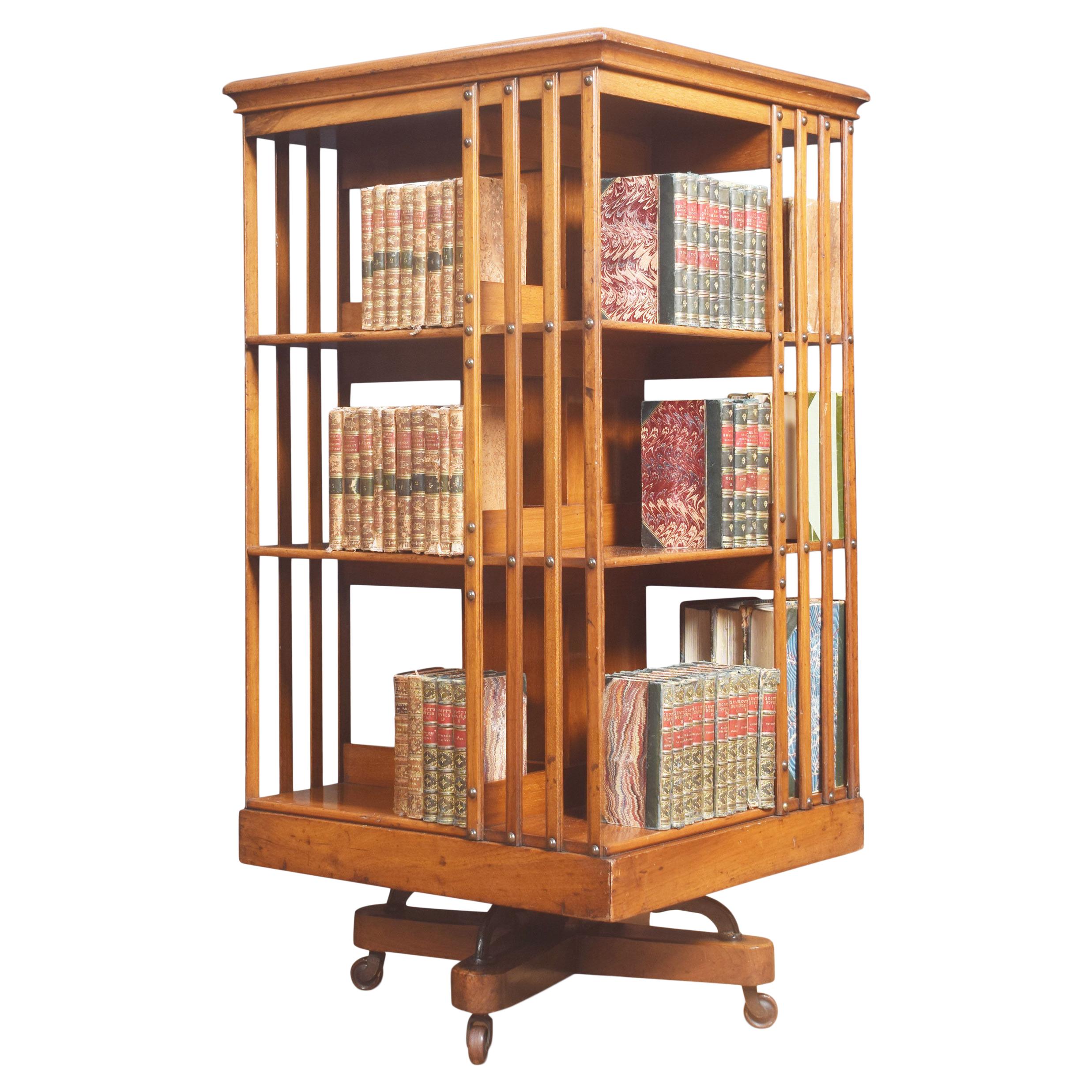 Walnut Revolving Bookcase by Maple and Co For Sale