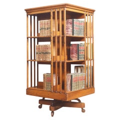Walnut Revolving Bookcase by Maple and Co