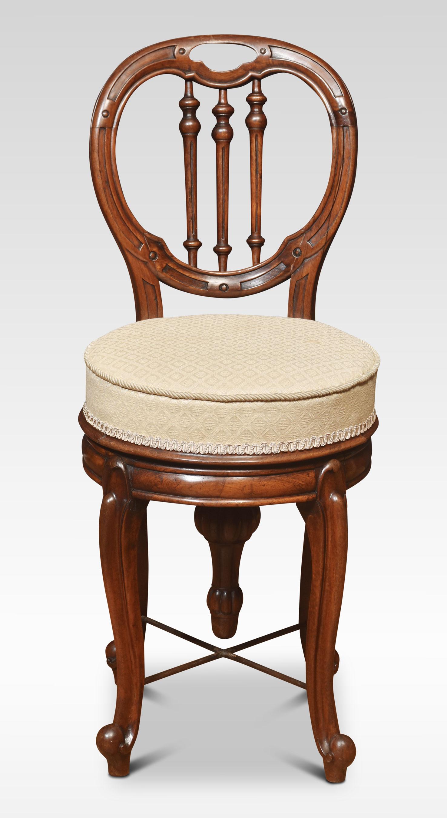 British Walnut revolving dressing chair