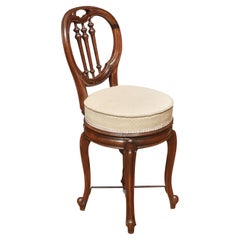 Walnut revolving dressing chair