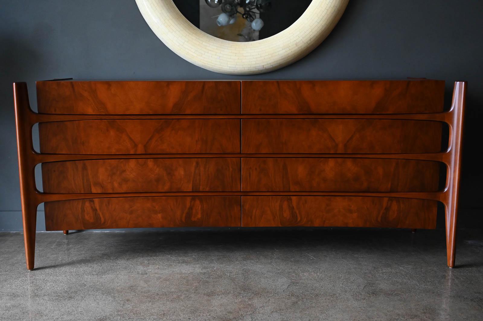 Walnut Sculpted Dresser or Credenza by William Hinn, ca. 1960. Beautiful dresser or credenza with fantastic walnut grain and sculpted legs and frame. Professionally restored in showroom condition, these pieces rarely come to market and this is one