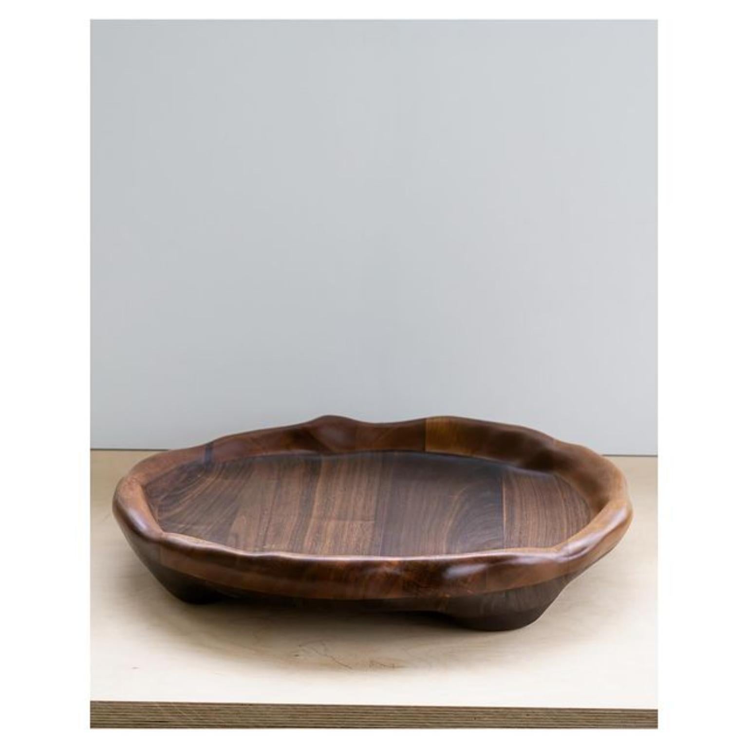 Walnut Serving Tray by Alexander Knysch
Dimensions: W 53 x D 53 x H 8 cm.
Materials: Walnut.

Alexander was born in kazakhstan in 1990 and moved to germany at the age of 4, where he grew up near stuttgart with his parents and two siblings.