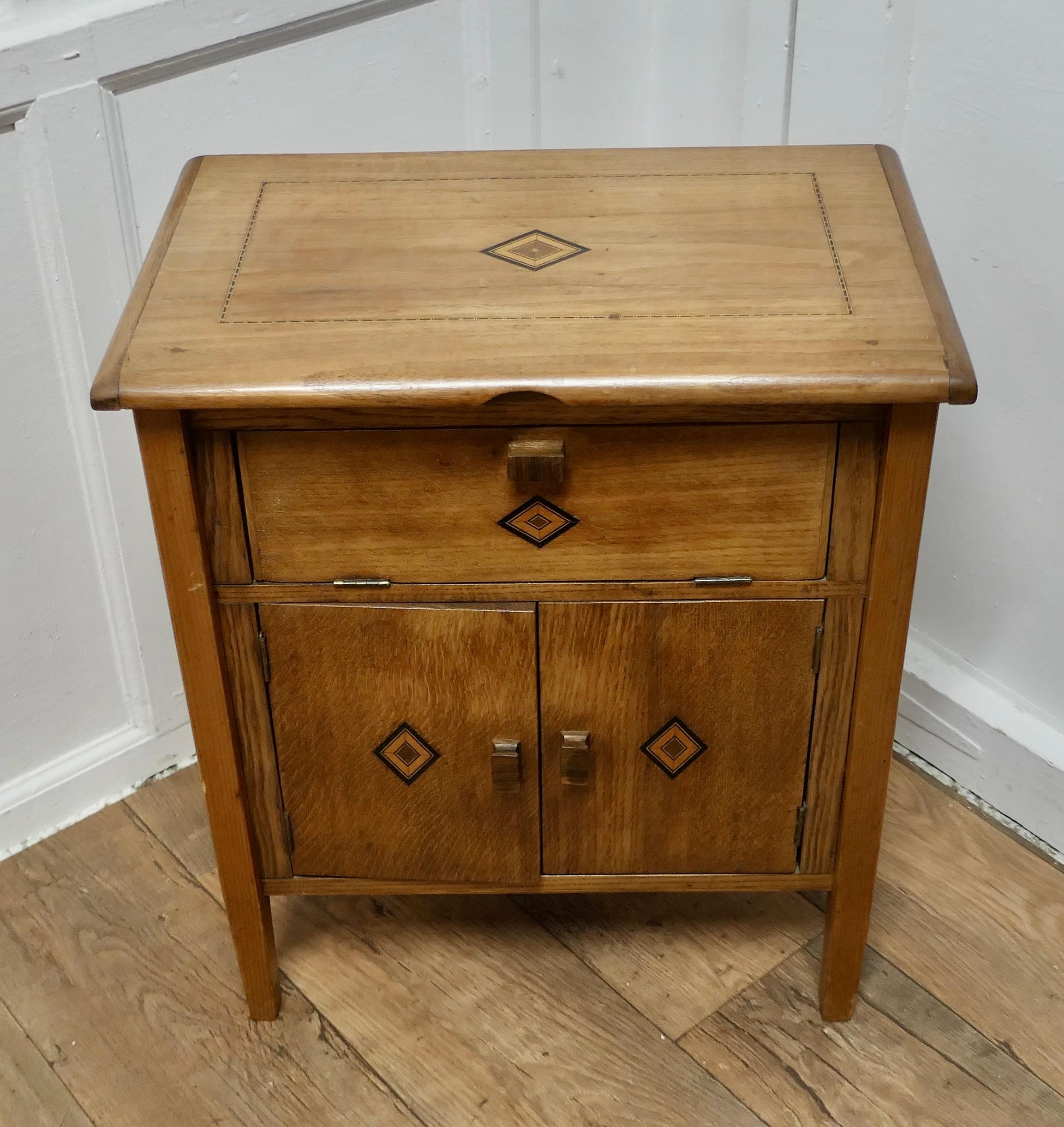 Adam Style Walnut Sewing Cabinet  This is a good and useful little cupboard   For Sale